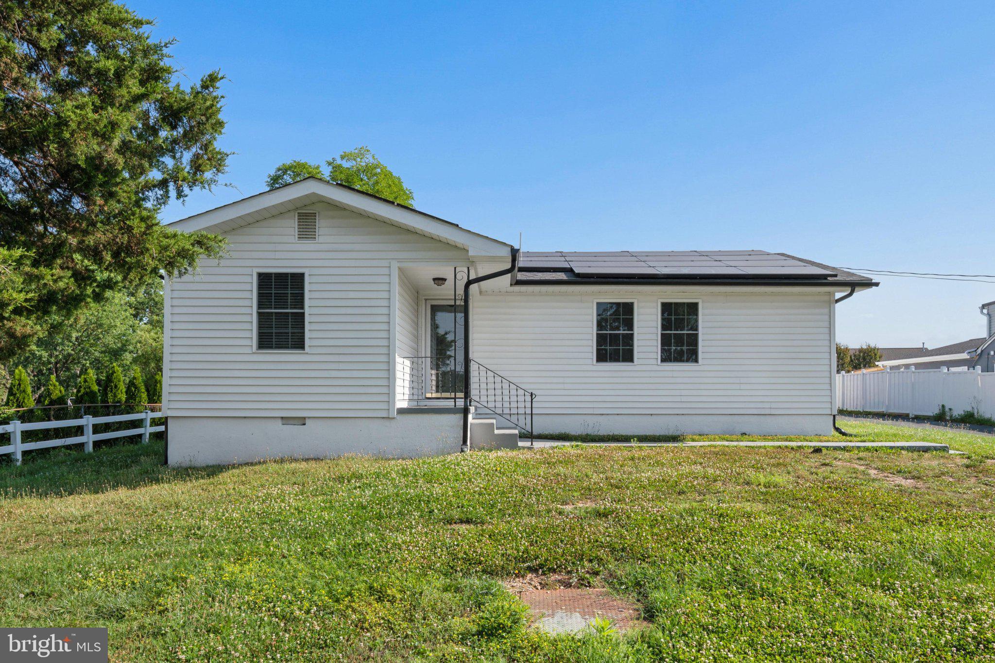 Beautifully updated rancher on nearly half an acre in the desirable Oakdale School District with no HOA and no city taxes! This move-in ready home features an open floor plan, vinyl plank flooring, an updated kitchen with granite countertops, and stainless steel appliances, three spacious bedrooms, updated baths, and a fully finished lower level offering endless flex space and a bedroom. A standout feature is the detached two-car garage with a finished upper-level suite complete with a full bath, heating and air conditioning—perfect for guests, a home office, studio, or additional living space. Conveniently located just minutes from Downtown Frederick, shopping, dining, major commuter routes, and the MARC train.