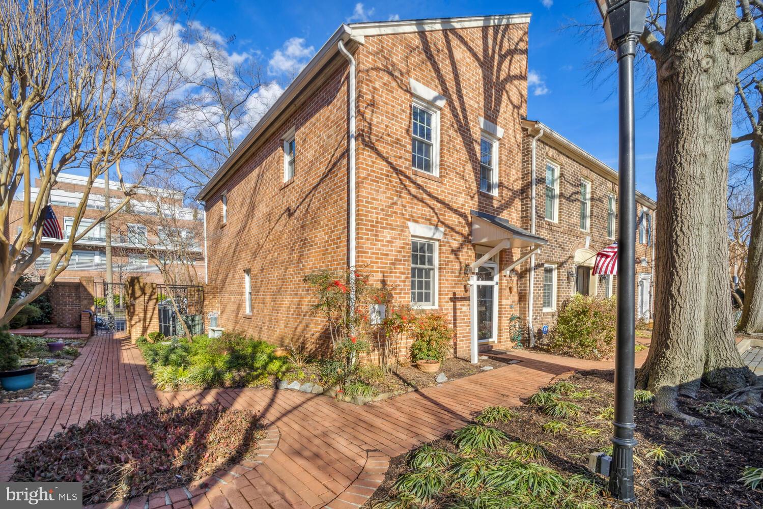 I am thrilled to present this beautiful end unit brick townhouse in the heart of Alexandria, VA. This home offers the perfect blend of convenience and nature, combining the charm of living in Old Town with the peacefulness of being close to parks and water. The unit comes with a its own assigned parking space right outside your door!

One of the standout features of this property is its unbeatable location. Situated within walking distance to all the shops, farmers market, restaurants, and ferry in Old Town, you'll have everything you need right at your doorstep. Additionally, Orronoco Park and Founders Park are nearby, offering the perfect opportunity to enjoy nature and outdoor activities like volleyball. You'll also have a front-row seat to the Alexandria's Birthday fireworks and numerous festivals happening in the area. This house is located just steps to Mount Vernon Trail, Trader Joes, and Harris Teeter and just five blocks to the famous King Street!

Privacy is another key selling point of this townhouse. Nestled on a cul-de-sac just a few blocks from the water, you'll enjoy a serene and secluded living environment. The brick walled, romantic private patio provides a tranquil space to relax and unwind after a long day. Not to mention, the brand new French doors with a smart lock pet door offer convenience and security for your furry friends.

Inside, you'll find a stunning granite kitchen with 48-inch cabinets, providing ample storage for all your needs. The top-of-the-line stainless steel appliances elevate the kitchen's functionality and aesthetic appeal. Hardwood floors throughout the home add a touch of elegance, while the built-in cabinets and shelves surrounding the wood-burning fireplace create a cozy and inviting atmosphere in the living room.

The upstairs boasts gorgeous renovated bathrooms, offering a spa-like experience. Meanwhile, a fully permitted half bath has been conveniently installed on the main level. New carpet has been added to one of the bedrooms, ensuring comfort and style. Updated windows not only enhance the home's energy efficiency but also provide plenty of natural light to brighten up each room. Generous closet space and extra storage under the stairs add to the practicality of this townhouse.

This end unit home boasts extra privacy and windows,

Don't miss this opportunity to live in the heart of Old Town Alexandria, enjoying the best of city living while still being able to embrace the tranquility of nature.  Schedule a tour today to experience all that this remarkable townhouse has to offer!
