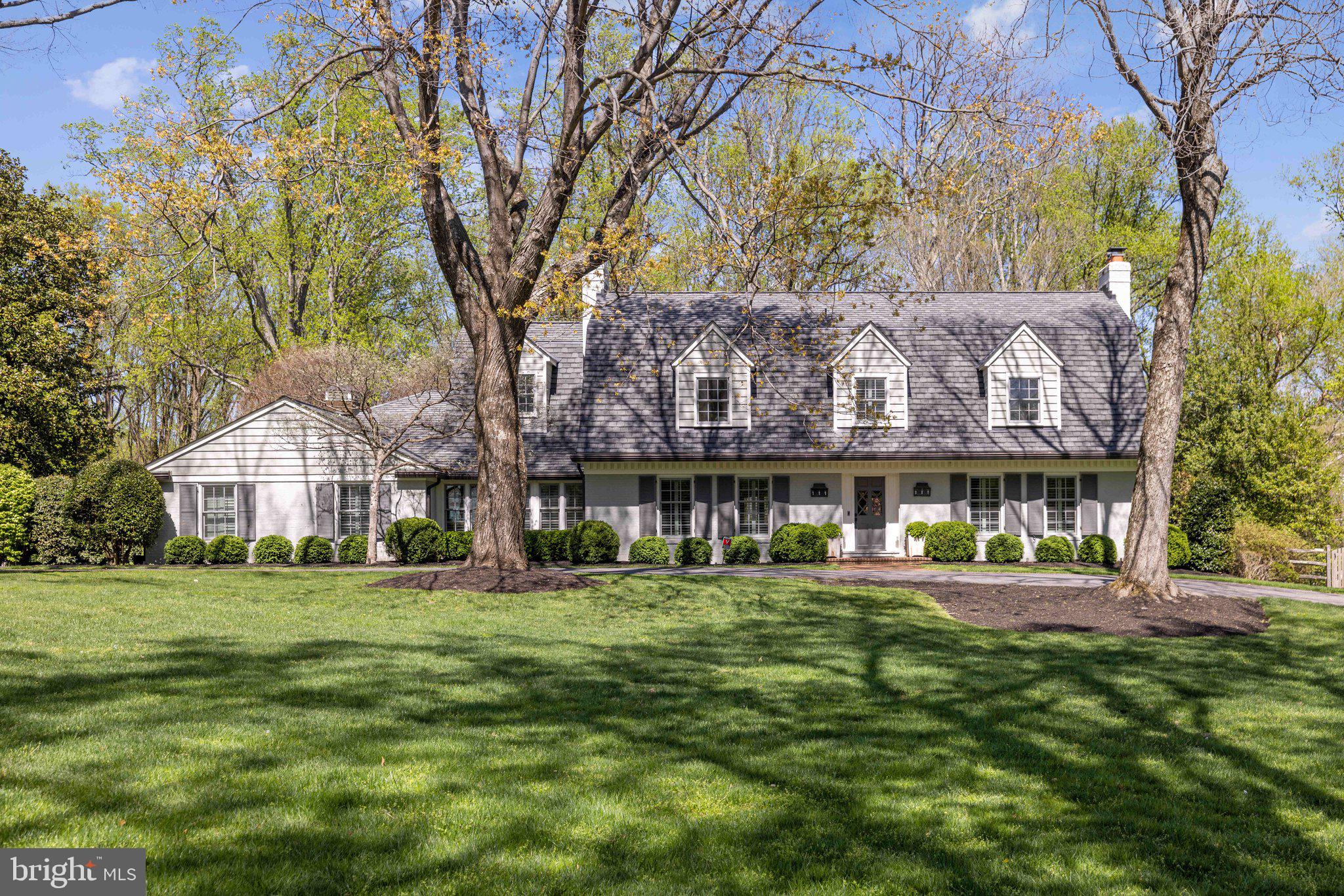 Welcome to your dream pool home in the heart of Potomac Village!  This stunning Colonial-style residence,  beautifully expanded & renovated in 2014, offers a perfect blend of classic charm and modern luxury. Nestled on a generous 2.23-acre corner lot, this property boasts exquisite landscaping and a partly wooded backdrop, providing a serene escape just minutes from the hustle and bustle. Step inside to discover an inviting interior featuring 5 spacious bedrooms and 4.5 bathrooms, designed for both comfort and functionality. The gourmet kitchen, complete with an oversized marble island and top of the line appliances, flows seamlessly into the family room and screened porch, making it ideal for entertaining. Enjoy cozy evenings on the screened porch by the fireplace or making s'mores at the firepit. The open floor plan is enhanced by hardwood flooring, plantation shutters, recessed lighting, and thoughtful built-ins throughout. For relaxation, retreat to the luxurious master suite with a soaking tub, steam shower and walk-in closet, or take a dip in your personal saltwater pool, which is heated for year-round enjoyment. The fully finished basement offers additional living space, perfect for a game room, recreation area and gym. With a circular driveway and a three-car side-entry garage, parking is a breeze. This home is not just a place to live; it’s a lifestyle. Experience the tranquility of nature with views of trees and woods, all while enjoying the comforts of modern living. Minutes to Potomac Village or MacArthur for easy commuting, Don’t miss the opportunity to make this exceptional property your own!