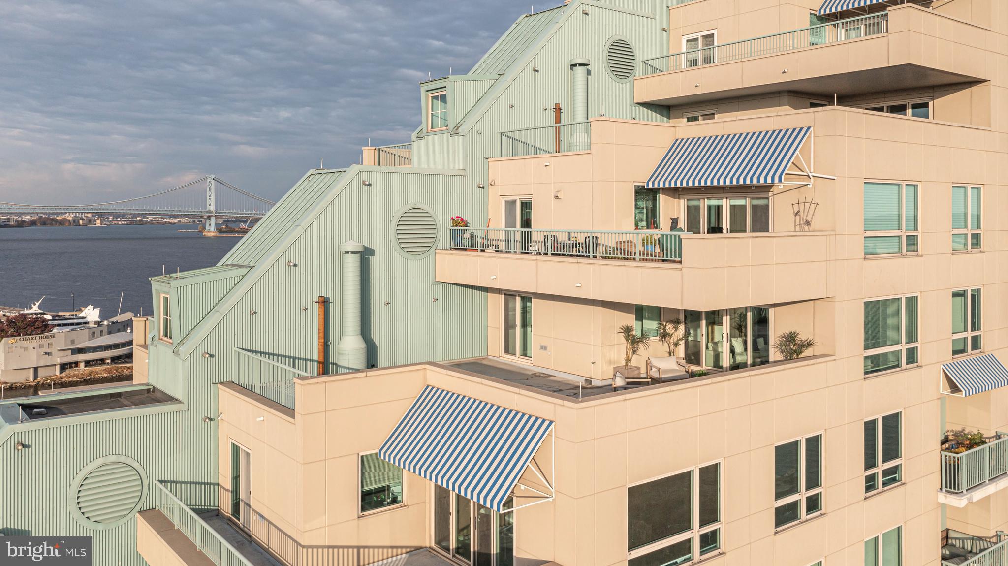 Take in the unparalleled  views from every window in your new condominium home at The Residences at Dockside.  Amazing 925 sq ft  oversized Terrace !
Unit 1102 is a very spacious 3 bedroom with 2.5 baths, corner unit on the 11th floor with1912 sq. ft.  with fantastic  Center City and  Water Views, showcasing the city skyline! Enjoy your outside wrap around 925 sq. ft. semi covered terrace with access from both the living room and kitchen.  This wonderful open floor plan design allows for easy one floor living.  The gourmet kitchen features new hardwood floors, new GE appliances, granite countertops and light-colored cabinets.  Enjoy spacious bedrooms with ample closet/storage space, and you primary suite has additional an  terrace accessed by both the primary and 2 bedroom.  Convenient assigned indoor parking with complimentary visitor parking and a weekday shuttle service. 
 Experience urban Philadelphia waterfront condo living the way it should be with a full menu of luxury amenities waiting for you every day, right at home.  Work out in the brand new, state-of-the-art fitness center or take a dip in the sparkling indoor swimming pool and hot tub.  With the special touches you’d expect at a resort, along with all the convenience & security of a gated residential property. 

Shown By Appointment Only