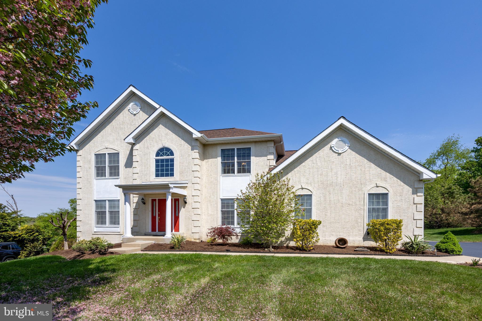 Welcome to 1345 Wooded Knolls  — a beautifully maintained colonial tucked into the sought-after Knolls of Birmingham community. Freshly seal-coated driveway, manicured landscaping with new mulch, and a classic colonial facade create outstanding curb appeal that makes a lasting first impression before you ever step inside. From the moment you enter, the hardwood-floored foyer sets an impressive tone, anchored by a gracious staircase that commands the space. To the right, a private office offers the ideal work-from-home setup, while to the left, the spacious living room flows naturally into the formal dining room — perfect for entertaining with ease. The updated eat-in kitchen is a true centerpiece, featuring granite countertops, a center island, ceramic tile flooring, and a sunny breakfast area — all flowing seamlessly into the main living spaces. A slider off the breakfast area opens directly to the oversized deck and stamped concrete patio, making indoor-outdoor living effortless whether you're hosting a summer cookout or enjoying a quiet morning outside. Just off the kitchen, the sunken family room — complete with a stunning brick gas fireplace — is bathed in natural light from oversized windows and a classic bay window, creating an inviting space you'll never want to leave. A conveniently located laundry room and powder room round out the main level. Upstairs, the primary suite is a true retreat featuring a generous walk-in closet and an updated private bath. Three additional spacious bedrooms and a hall bath with dual vanity provide plenty of room for family and guests alike. The finished basement delivers exceptional flex space — ideal for a recreation room, gym, or media room — along with a full bath, dedicated storage room, and an egress window that opens the door to future possibilities. A 2-car garage, REME HALO whole home air purifier, a community with so many amenities including pickleball courts, and a premium location just minutes from the vibrant West Chester Borough and Kennett Square Borough, with easy access to Route 202 and major commuter highways, complete this exceptional offering.