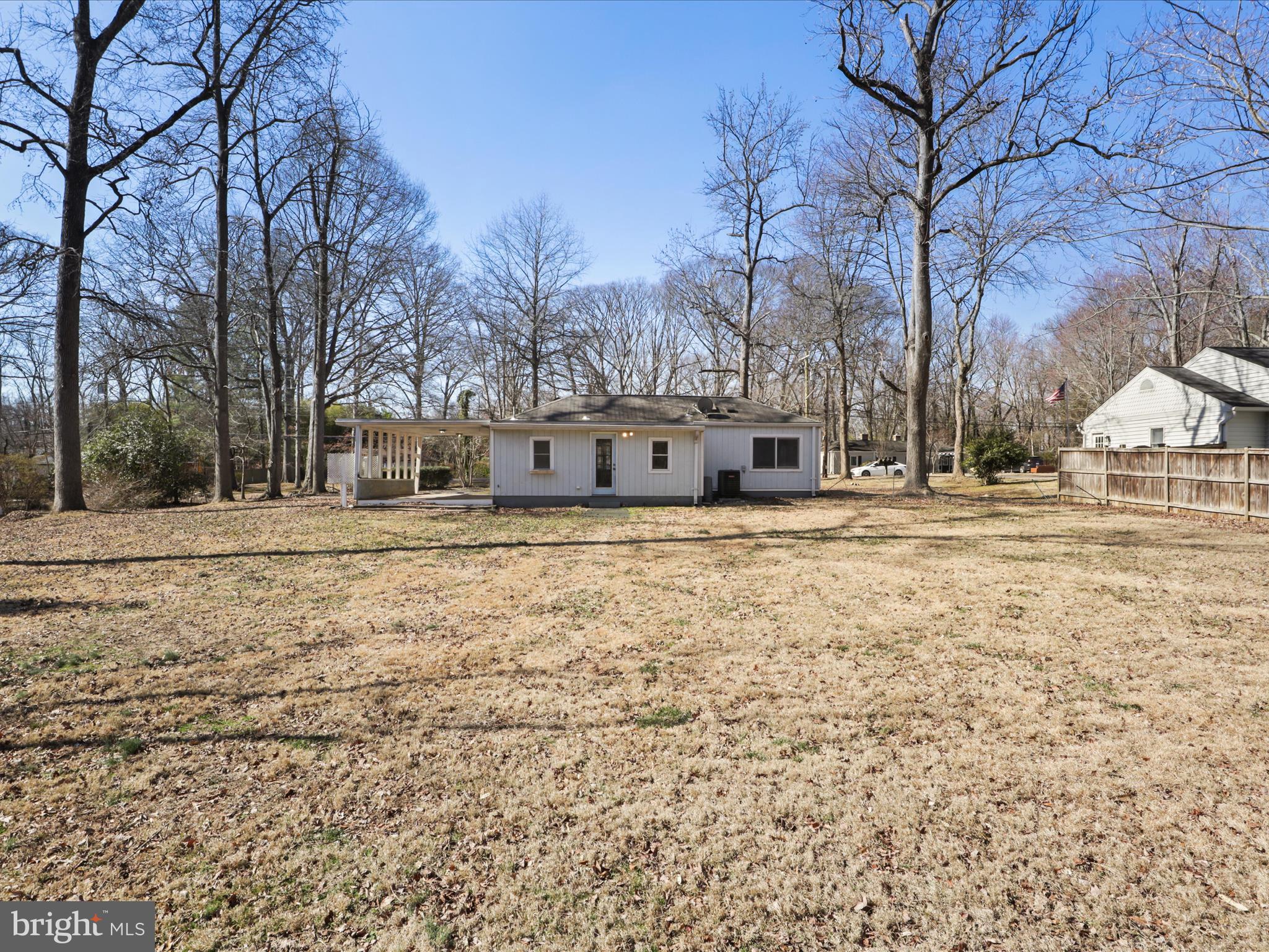 Detached 1 BR/1 BA  property with Carport for the price of an apartment in sought after Hybla Valley Farms! This rare on the market single level rancher includes all living space on one level to include the kitchen, living room, bedroom, full bathroom and laundry room that includes space for storage. The home resides on a completely flat 1/2 acre lot, mostly in the back yard for ample privacy. Home is located right off of Route 1, providing a quick commute into DC, Old Town or West to Tysons and is nearby many retail locations including Target, Walmart, Grocery Stores, Coffee Shops and many Restaurants to conveniently choose from. Property will be fully painted before the next tenant moves in and will be available on March 1st, 2025.  Do not miss this very unique opportunity to have a lot of privacy and space at this price point!