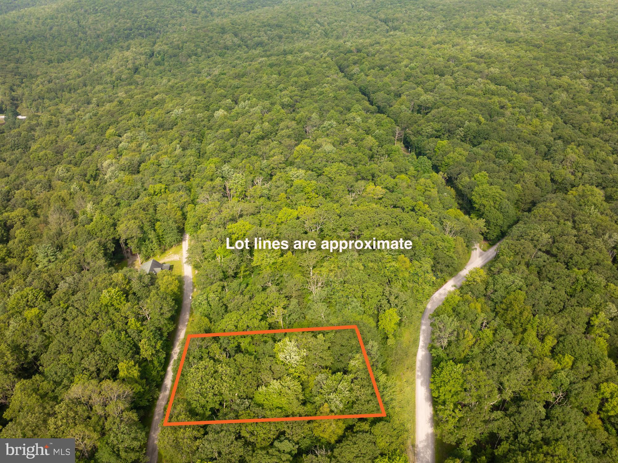 Tucked away in the stunning mountains of Western Maryland, this unbuildable lot provides a serene escape into nature, offering breathtaking views throughout the community, as well as an abundance wildlife. Located in the Youghiogheny Mountain Resort, this membership-only lot grants exclusive access to over 50 miles of private roads and trails, ideal for ATV and side-by-side adventures. Resort amenities include a community clubhouse, playground, picnic pavilion, and designated hunting and fishing areas, making it the perfect retreat for outdoor enthusiasts.