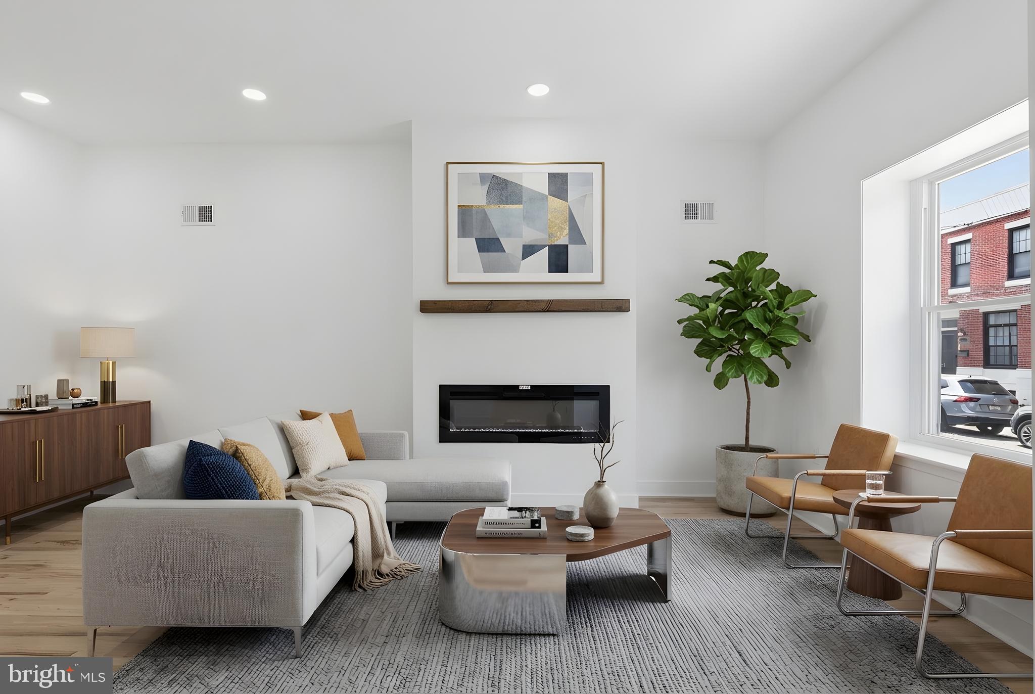 Located in Grays Ferry, just minutes from CHOP, Penn, shopping, dining, neighborhood parks, and with easy access to I-76, this fully renovated home offers both convenience and comfort. Rebuilt from the studs with City of Philadelphia permits and L&I-approved plans, the property features approximately 2,334 square feet of living space, including a fully finished basement. The main level offers a bright, open layout with an electric fireplace, powder room, and spacious living and dining areas. The kitchen combines style and functionality with stainless steel appliances, ample cabinet space, and direct access to a private fenced rear patio. Upstairs, you’ll find generously sized bedrooms with ample closet space and a full bathroom. The finished basement adds flexible living space with high ceilings and a dedicated laundry area. Tucked away on a quiet street near Donald Finnegan Park, featuring playgrounds, sports fields, and community events — this home blends charm, space, and location with close proximity to everything you need. CHOP’s Main Campus is just 1.6 miles away, approximately an 8–14 minute drive.