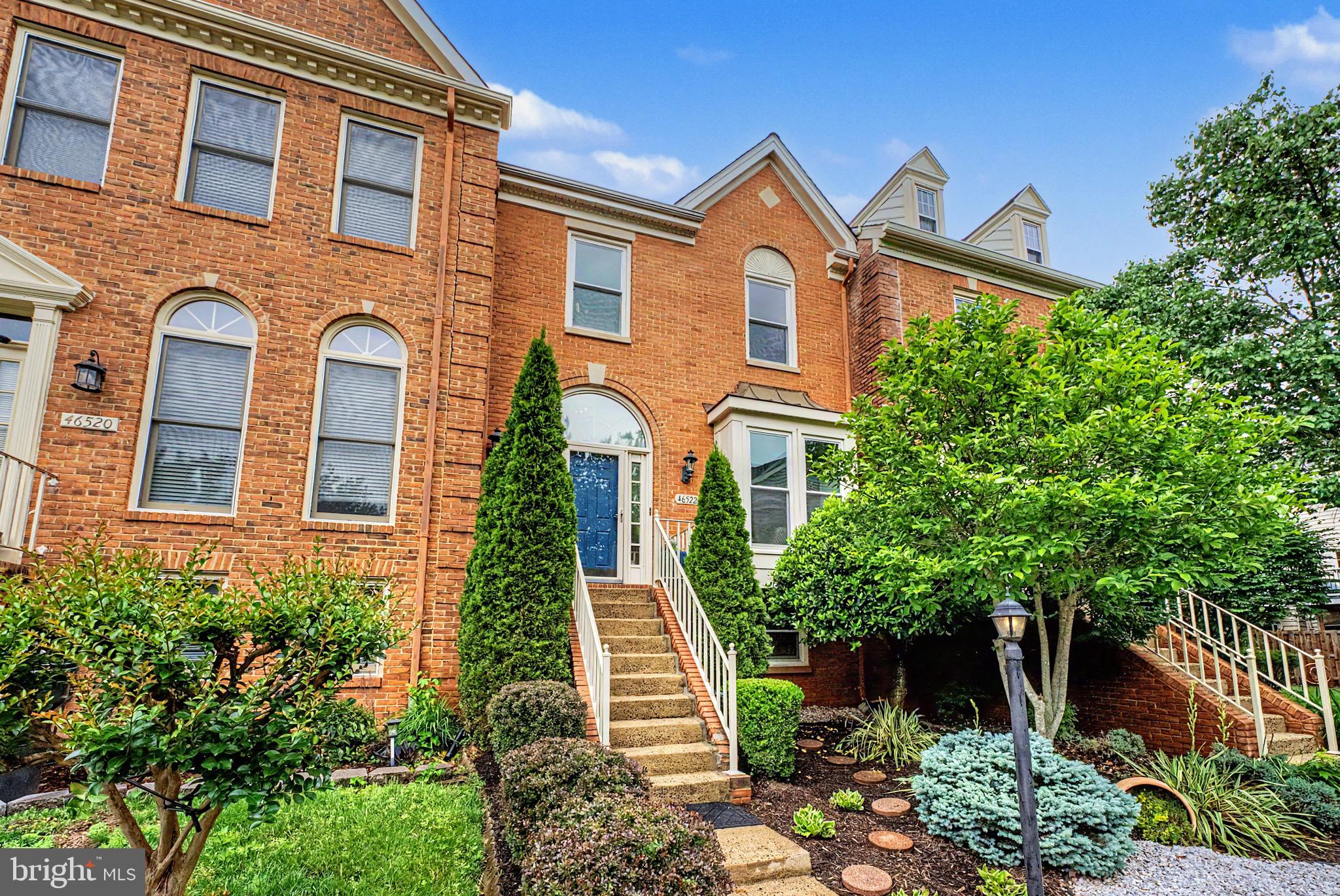 Welcome home to this exceptional 4 Bedroom 3.5 Bath three-level brick-front townhome backing to Algonkian Regional Park offering the perfect blend of style, comfort, and functionality. Nestled in a desirable setting backing to mature trees, this meticulously maintained home features spacious living areas, thoughtful updates, and inviting outdoor spaces ideal for everyday living and entertaining.  Step inside to the foyer highlighted by an elegant arched transom window and gleaming hardwood floors that flow throughout the main level. The Living Room is warm and inviting, featuring a stunning shiplap accent wall, contemporary linear  electric fireplace, crown molding, and abundant natural light. Adjacent to the Living Room, the separate Dining Room showcases decorative columns, chair rail, crown molding, and shadow boxes, creating an elegant space for hosting family and friends. The updated gourmet Kitchen is the heart of the home, boasting granite countertops, stainless steel appliances, a center island with gas cooktop, extensive cabinetry, recessed lighting, and a spacious pantry. The adjoining Breakfast Area and Family Room provide an open-concept layout perfect for gathering, with direct access to the private rear deck overlooking serene wooded views. Retreat upstairs to the spacious Primary Suite featuring vaulted ceilings, a large walk-in closet with custom organization, and an updated spa-inspired Bathroom complete with dual vanities, upgraded lighting, soaking tub, and convenient upper-level Laundry. Additional 2 upper-level Bedrooms offer generous space, ample closet storage, and updated finishes throughout. The walkout lower level provides incredible flexibility with a large Recreation Room highlighted by a cozy gas fireplace, custom built-in beverage center/bar, recessed lighting, and direct access to the covered patio and fenced-in Backyard. An additional bedroom and Full Bath make this level ideal for guests, a home office, or multigenerational living. A substantial unfinished storage and utility area provides abundant storage space which includes a 2nd set of washer and dryer. Additionally, a spacious 24' x 10' attic provides valuable extra storage space, offering a practical solution for seasonal items, holiday décor, luggage, and more!  Outdoor living is equally impressive with a private deck, covered patio, fenced rear yard, and peaceful wooded backdrop creating a tranquil retreat for relaxing or entertaining.
Additional highlights include: Gas hot water heater (2021);  Roof (2015); Windows (2010)
Conveniently located near shopping, restaurants, parks, commuter routes, and everyday amenities, this move-in ready home offers the perfect combination of elegance, comfort, and location. A rare opportunity to own a beautifully updated townhome with exceptional indoor and outdoor living spaces.
Enjoy all of Cascades' amenities, including five community pools, tennis and pickleball courts, basketball and multipurpose courts, playgrounds, fitness center, party rooms, and miles of scenic walking and biking trails. Conveniently located near Algonkian Regional Park, golf, Potomac River access, shopping, dining, commuter routes, this home offers an exceptional lifestyle in one of Northern Virginia's most sought-after communities.
