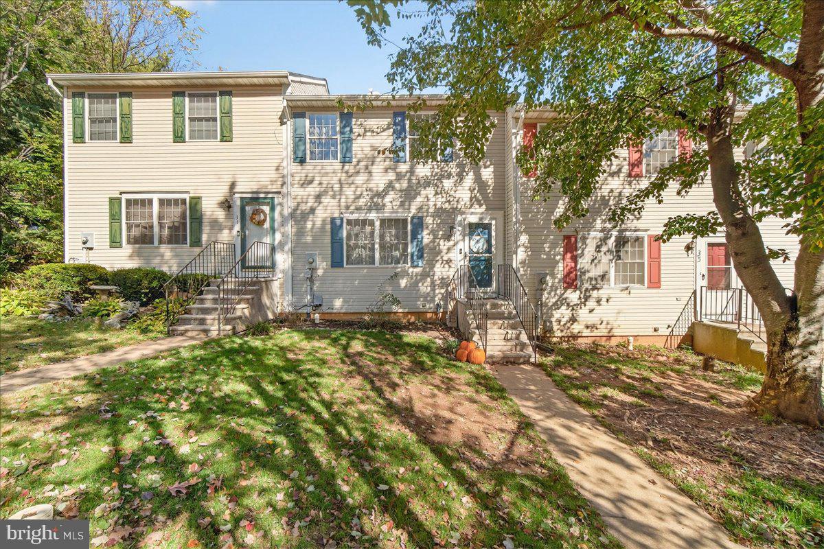 Discover this rare, fully updated townhome in the sought-after Mount Airy Manor subdivision!