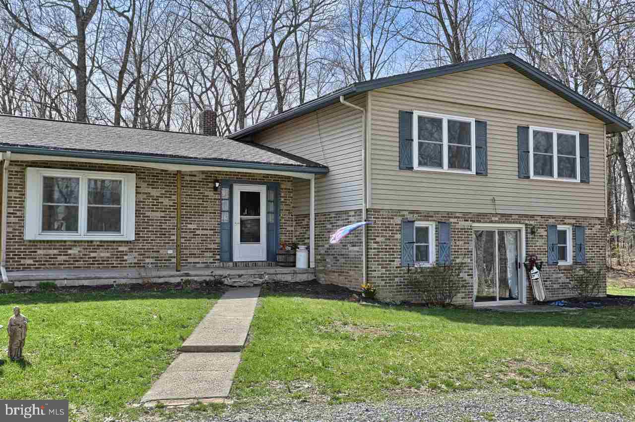2,750 SQUARE FOOT HOME ON 2+ ACRES. THIS HOME FEATURES 5 BEDROOMS, 3 BATHROOMS, AND LARGE FAMILY ROOM IN THE WALK OUT BASEMENT! GET READY FOR THE WARM WEATHER LOUNGING BY THE IN GROUND POOL! COZY UP TO THE GAS FIREPLACE DURING THE COLD WINTER MONTHS ! BEST OF BOTH WORLDS!