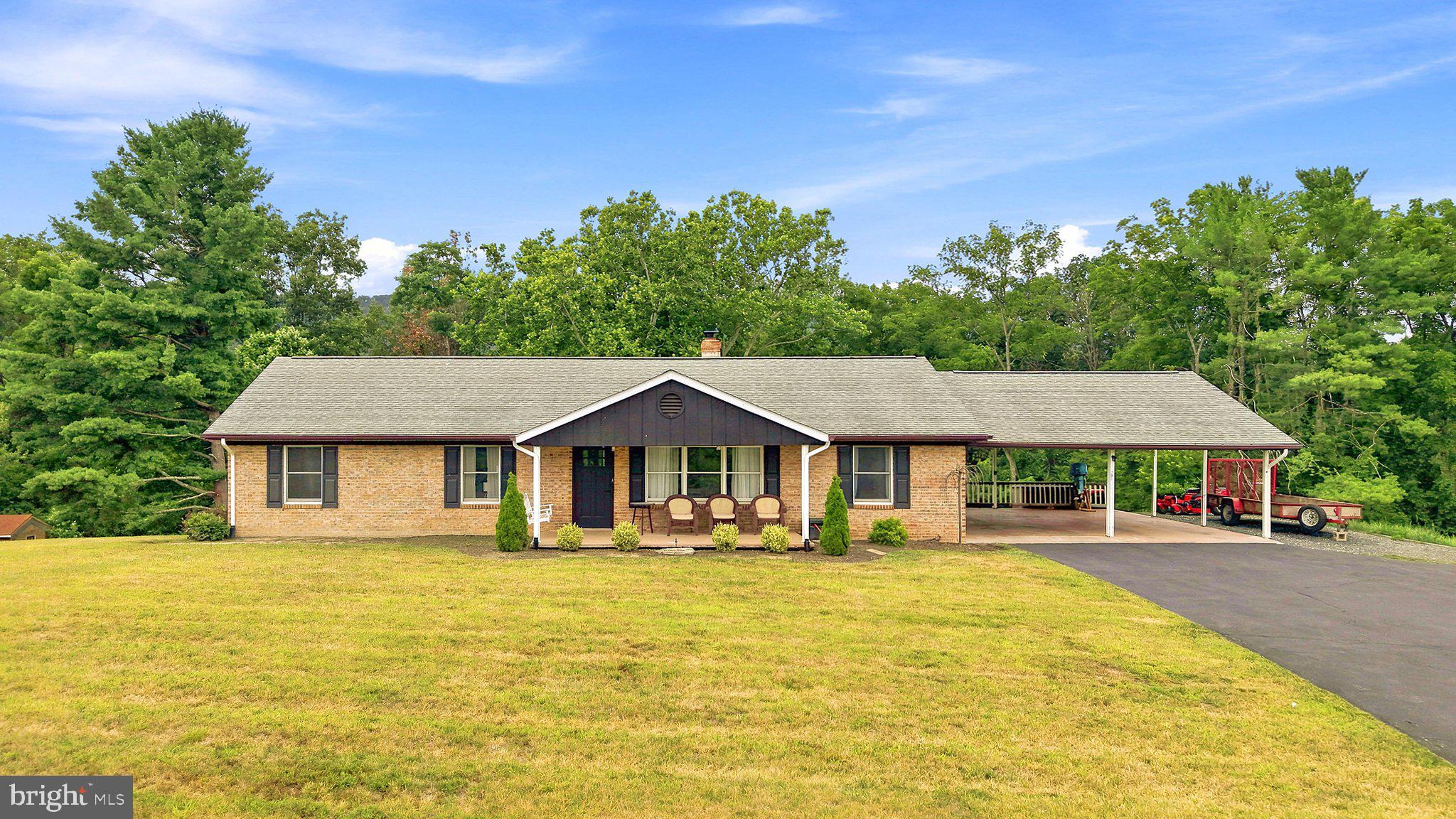Enjoy the perfect blend of country charm and modern convenience! Situated on approximately 0.71 acres, this beautifully updated 3-bedroom, 2-bath home offers approximately 1,740 square feet of comfortable single level living space, plus a full unfinished walk-out basement (1,740 sqft) ready for future expansion, additional living space, a workshop, or abundant storage.

The interior features an open and functional layout with granite countertops, shaker-style cabinetry, stainless steel appliances, updated flooring, recessed lighting, and beautifully renovated bathrooms. Thoughtful updates throughout create a move-in ready home while still allowing room to add your own personal touches over time.

Outside, you'll find plenty of space to enjoy with a 2-bay carport, detached storage shed, and additional attic storage. Whether you need room for outdoor equipment, hobbies, or seasonal décor, this property offers the storage and flexibility you've been looking for.

Conveniently located on Route 42, you'll enjoy the peace of country living while remaining just minutes from Woodstock, shopping, dining, and easy access to Interstate 81, making commuting a breeze.

With updated finishes, generous storage, and a full walk-out basement offering endless possibilities, this home is ready for its next owner to move in and make it their own.