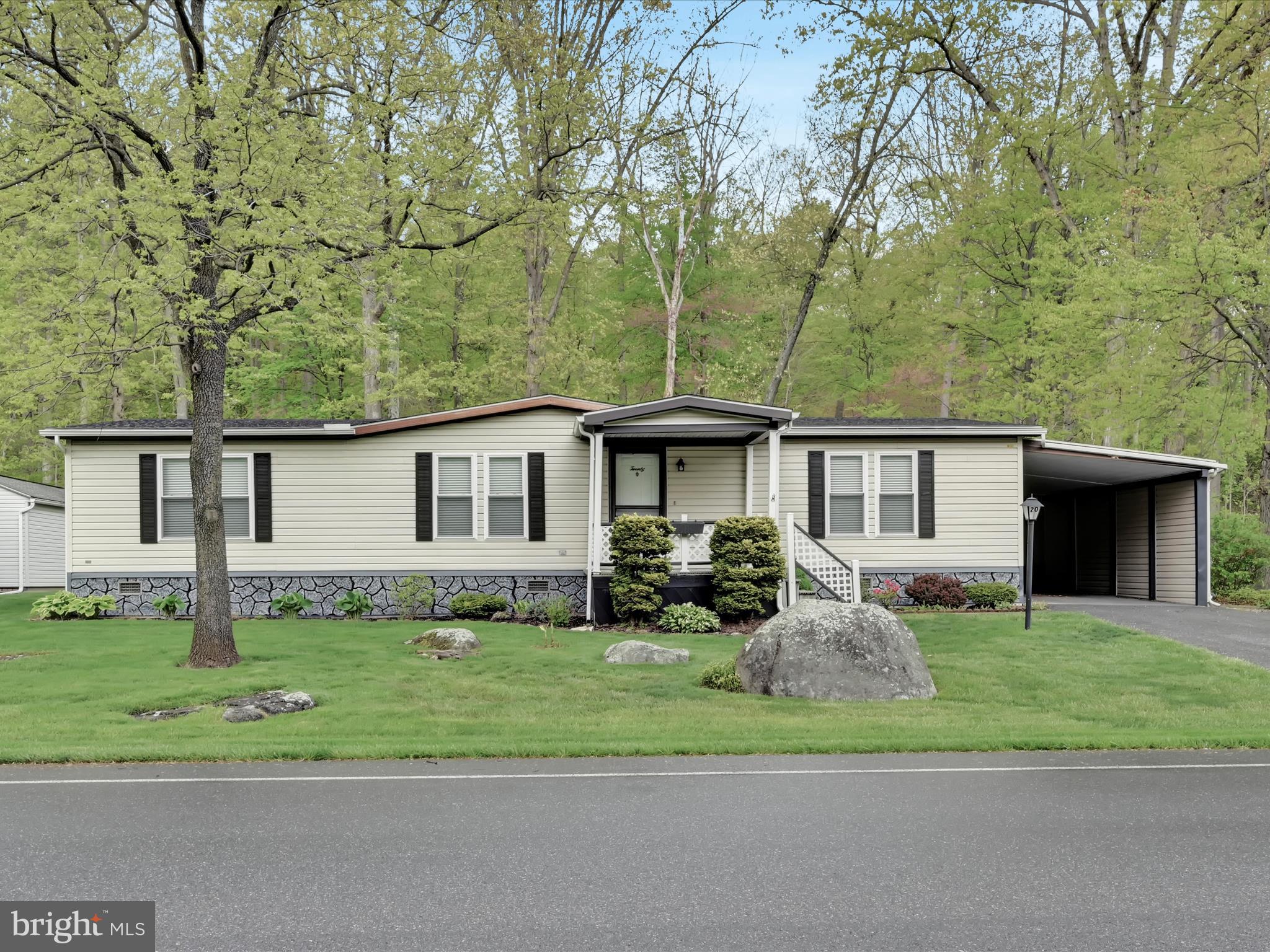 This home is located in the desirable Gretna Springs 55+ Community. Featuring 2 bedrooms, and 2 full bathrooms, a large living room that leads to a dining room, kitchen and family room. There are laminate floors throughout, a main floor laundry room, central air, an attached garage with access directly to the home, and a closed sunroom that leads onto a back patio and private back yard backing up to the woods, and more! There is a shed form more storage.   If you have been looking for one floor, maintenance free living, convenient to Hershey, Lancaster, Lebanon, or the PA turnpike, this is the house for you.  Are you a hiker? Lovely quiet streets and close to Hiking Trails. This home is centrally located off Route 72 just minutes from the PA Turnpike and Route 322.