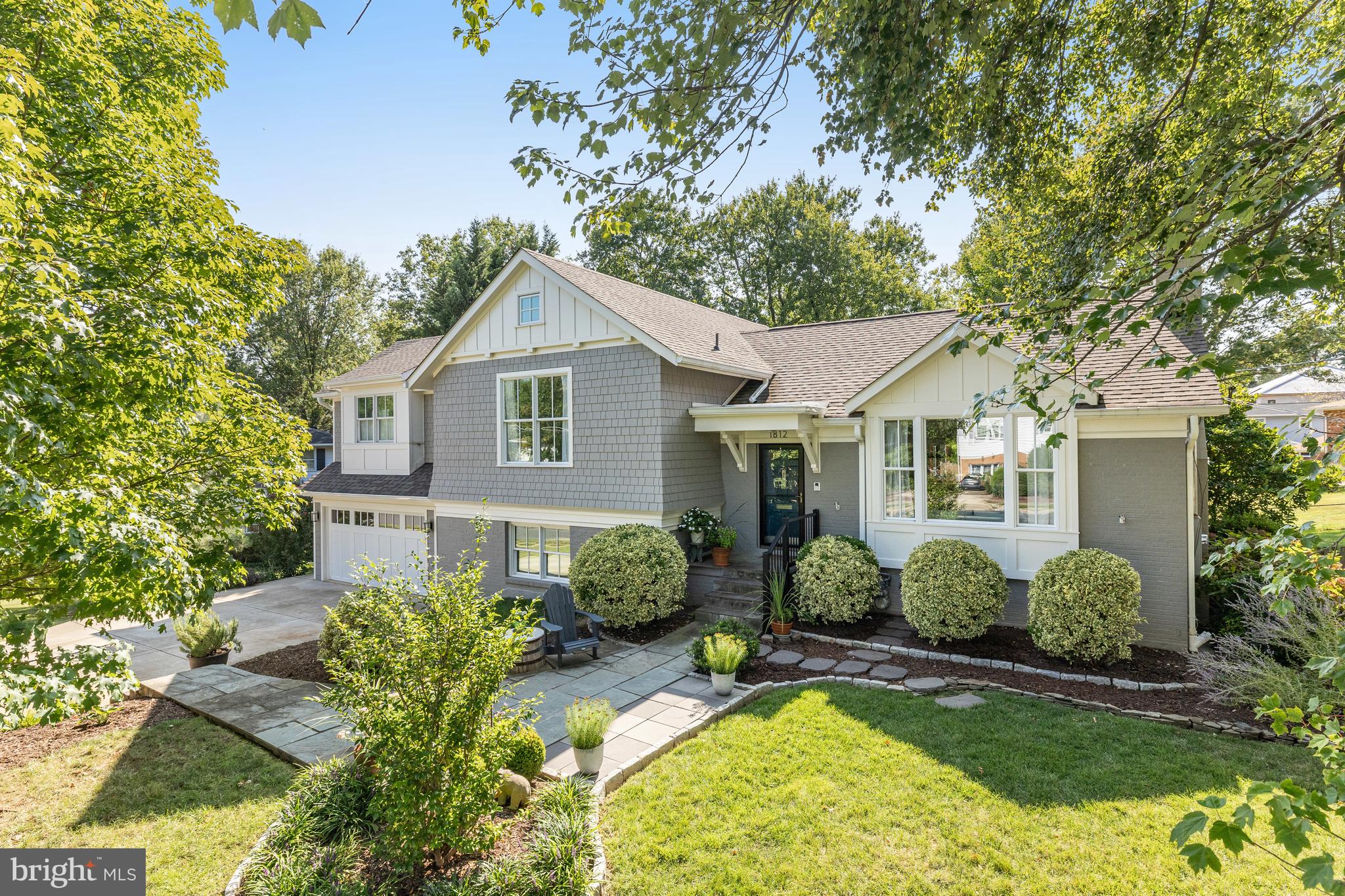 Completely reimagined from top to bottom with designer details throughout. Exceptional curb appeal with mature landscaping and new slate front walk welcomes you to this enchanting, fully renovated home, tucked inside a cul-de-sac neighborhood in the McLean High School pyramid, just minutes to downtown McLean and Tysons corner.
With over $600k in upgrades, including an addition completed in 2017, this 4 bedroom, 5 bath home has over 3,330 sq ft of living space on 4 levels.  The main level open floor plan, with cathedral ceiling, is bright and airy - inspiring easy entertaining, or daily family living, with a cozy conversation space, wood-burning fireplace and large screen wall-mounted TV. The integrated dining area has a built-in bench to accommodate seating for up to 10 people. The beautifully designed kitchen features a large island with bar seating, quartz countertops, stainless steel appliances including French drawer refrigerator, dual-fuel six burner range (or 4-burner with griddle) with hood exhaust, under counter beverage refrigerator and icemaker. Other thoughtful details include an appliance garage, mixer cabinet, large drawers for easy organizing and storage (including hidden kick drawers), a bar/prep sink with disposal and side faucet for filtered cold water as well as instant hot water. 
The upper level, with hardfloor floors and oversized windows throughout, includes the addition of the primary bedroom suite with cathedral ceiling, two walk-in closets, plus a home office space that can be made into a third closet if more storage is needed. The spacious primary bathroom features two vanities, with designer light fixtures and walk-in steam shower. Two additional bedrooms, each with walk-in closets, two additional full baths, and multiple storage closets complete the upper level.
A few steps down brings you to the light-filled family room, the fourth ensuite bedroom and access to the oversized garage that has two tandem spaces, or two spaces and a large workshop area, and direct access to the backyard. The lower level multi-use space offers so many options - an in-law suite, an au pair suite, a home office, exercise room, craft room, playroom…a full bath and laundry facility with direct access to the backyard complete this level. 
The gorgeous screened-in cedar porch, with tongue and groove hardwood floors, is an ideal space for morning coffee, lazy afternoons, evening cocktails and dining alfresco. The newly built deck leads to the backyard, which provides extensive outdoor entertainment options with a large, usable lawn, shaded with mature landscaping, and hard-scaped area for grilling and sitting around the fire pit.
Public water and public sewer.