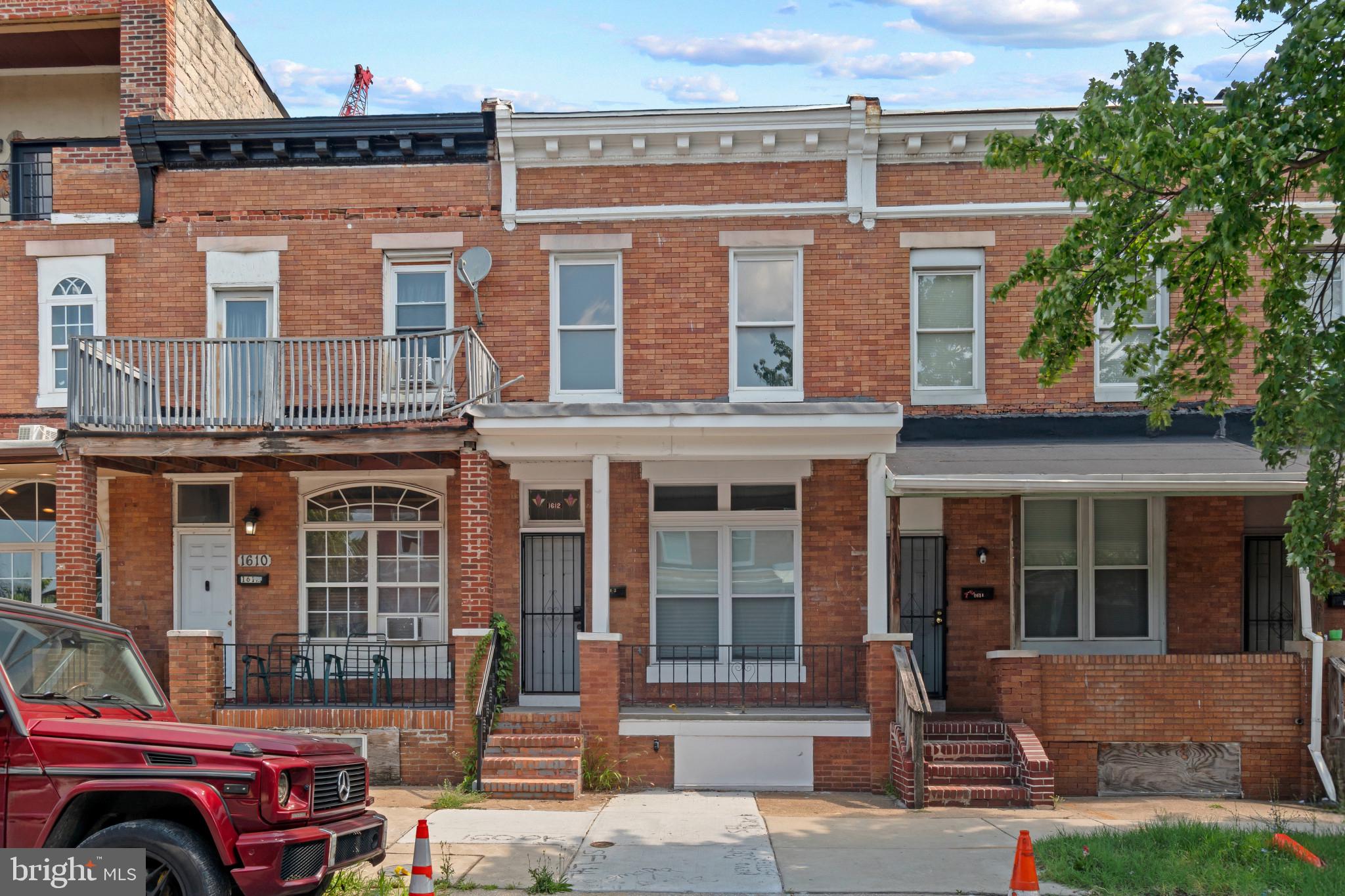 Discover 1612 E 25th St — a move‑in‑ready rowhome with a clean, functional layout. The main level offers a convenient half bath and laundry area, while the upper level includes two bedrooms, a full bath, and a bonus room perfect for work or relaxation. With a location close to city amenities and commuter access, this home delivers comfort and convenience at an affordable price.