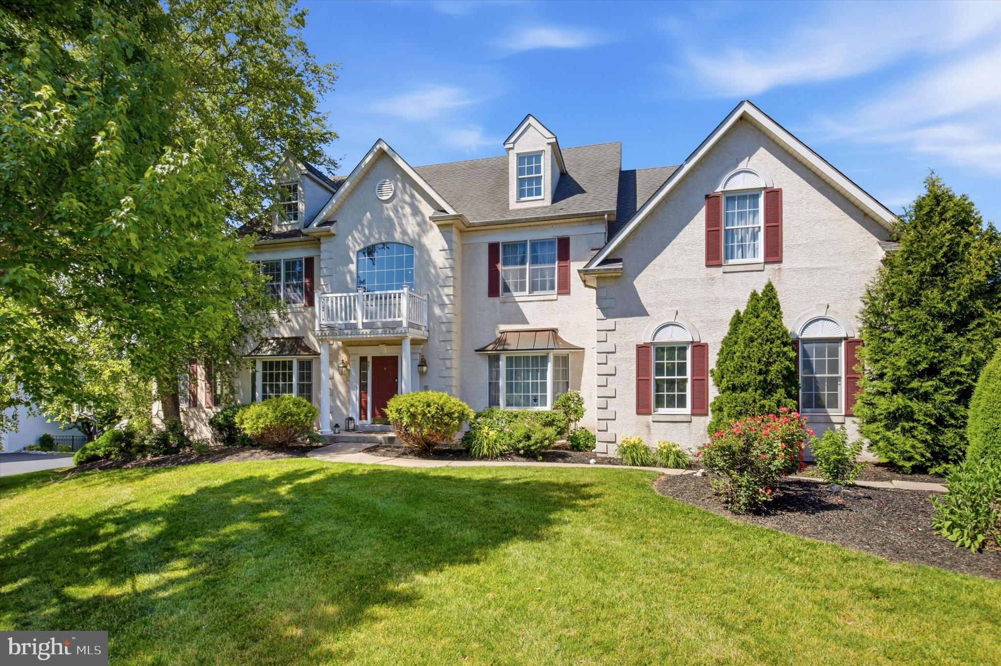 Welcome to this spectacular, meticulously maintained residence showcasing elegant design and exceptional care by its original owners. From the moment you arrive, the pride of ownership is evident, offering a canvas that is move-in ready and awaiting its next chapter. The main level begins with a dramatic, light-filled two-story foyer that flows seamlessly into a thoughtfully designed floor. At the heart of the home is the beautiful eat-in kitchen, complete with a sizable center island, ample cabinetry, and gleaming granite countertops. The kitchen opens directly to a sun-drenched eating area with an exit to the rear deck. Just beyond, the breathtaking two-story family room serves as a dramatic gathering space, anchored by a cozy fireplace and featuring a convenient rear staircase. Formal living and dining rooms provide refined, sophisticated spaces for hosting larger gatherings, while a private conservatory with French doors offers incredible flexibility as a music room, sunroom, or extended entertainment space. A welcoming home office behind elegant French doors provides the perfect quiet workspace. A main-floor powder room and a dedicated laundry room complete this level. The upper level is a private sanctuary. The oversized primary suite serves as a true retreat, boasting a dedicated sitting area, dressing area, and expansive walk-in closets. Its ensuite bathroom has a whirlpool soaking tub and a separate stall shower. Three additional generously sized bedrooms and two full bathrooms complete this upper level, ensuring comfort and privacy for family and guests alike. The standout feature of this property is the fully finished, daylight walkout basement. Uniquely designed as a fully appointed, comprehensive in-law or guest suite, this level is a rare find. It offers flexible layout options for 2 to 3 bedrooms (or two bedrooms and a private lower-level office), a full bathroom, a comfortable living room, and a distinct dining area. The full lower-level kitchen features abundant countertop space and cabinetry, opening to a large family room with sliding doors that lead directly outside. Abundant storage options and meticulous architectural design make every inch of this home as functional as it is visually impressive. Do not miss the opportunity to own this premier home.