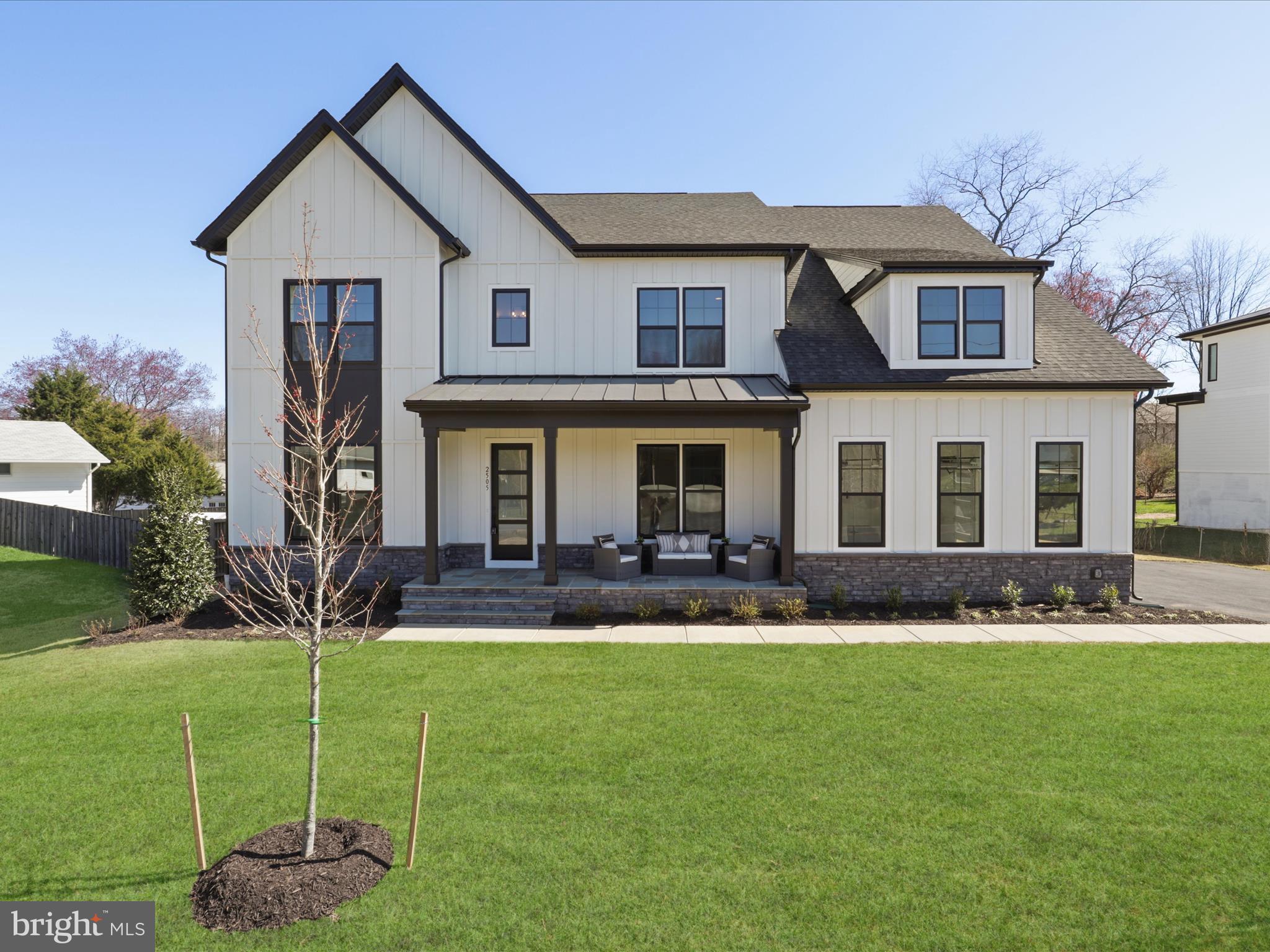 Experience the small-town charm and close-knit community of Vienna while enjoying incredible shopping, dining, and year-round events like Oktoberfest, Viva Vienna, and the Halloween Parade. With walkable access to top-rated schools, this location offers both convenience and a sought-after setting.  Evergreene Homes is proud to present The Chapman, our most popular floor plan, now featuring a stunning Modern Farmhouse elevation and our Diamond Finishes Package.
This thoughtfully designed home boasts an impressive array of spaces, including a Morning Room Extension, Main-Level Guest Suite with Full Bath, Main-Level Study, and Butler’s Pantry. Upon entering, you’re welcomed by gleaming hardwood floors, soaring 10-foot ceilings, an expansive Study, and a formal Dining Room. The Designer Kitchen is a chef’s dream, featuring a 6-burner gas range, double wall ovens, an oversized island with seating and extra storage, quartz countertops, and all soft-close cabinetry for a sleek aesthetic. Designed with comfort and function in mind, the Great Room showcases a modern linear fireplace, a dedicated entertainment wall, and a striking beamed ceiling. A well-appointed Mudroom provides ample storage for shoes, bags, and sports equipment. The finished basement expands the living space with a Rec Room, Media Room, Exercise Room, Bedroom, and Full Bath, offering endless possibilities for entertainment, fitness, and relaxation.
Upstairs, the luxurious Owner’s Suite is a standout, featuring a generous Sitting Room, two box ceilings, and oversized Walk-In Closets with convenient access from both the bedroom and bathroom—one of our most praised design features. The spa-inspired Owner’s Bath includes a frameless shower, soaking tub, and generous his-and-hers vanities with ample storage. The additional three upper-level bedrooms are well-sized, with one featuring an en-suite bath and two sharing a Jack-and-Jill bath. A striking modern metal railing staircase adds to the home’s contemporary aesthetic, enhancing both style and openness. Completing this exceptional home is a sizable backyard, ideal for outdoor entertaining, play, and relaxation, along with a three-car garage for convenience and extra storage.
Our homes always include exceptional quality features, such as a whole-house fan to improve indoor air quality, a built-in humidifier and electronic air cleaner for added comfort, and abundant recessed lighting throughout.Thoughtful construction includes 2x6 framing and thermal insulation for superior efficiency, pest tubes in exterior walls for built-in protection, and a 10-year transferable Builder’s Warranty for peace of mind.
Experience unparalleled design, comfort, and craftsmanship in this remarkable home. Schedule your tour today!
