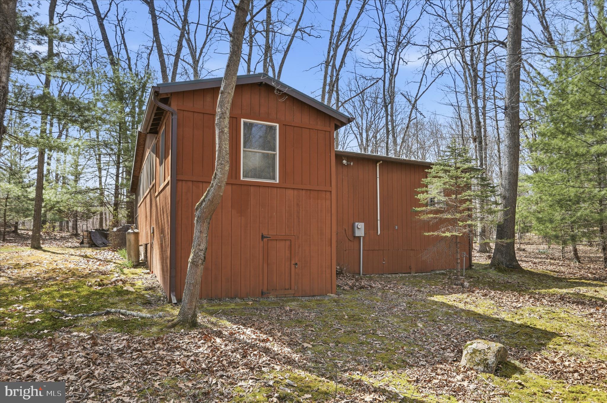 Meticulously maintained 3-bedroom, 1-bath cabin tucked away in the heart of the highly sought-after Lost River Valley. This charming retreat blends rustic appeal with comfortable living, featuring a warm and inviting interior, well-appointed bedrooms, and a serene setting surrounded by natural beauty and mountain views. Thoughtfully cared for and move-in ready, the property offers exceptional versatility as a private getaway, full-time residence, or turn-key short-term rental investment. Enjoy peace, privacy, and the relaxing lifestyle this special cabin has to offer. Property is being sold as a turn-key short term rental. All Furnishings and Personal Belongings included.