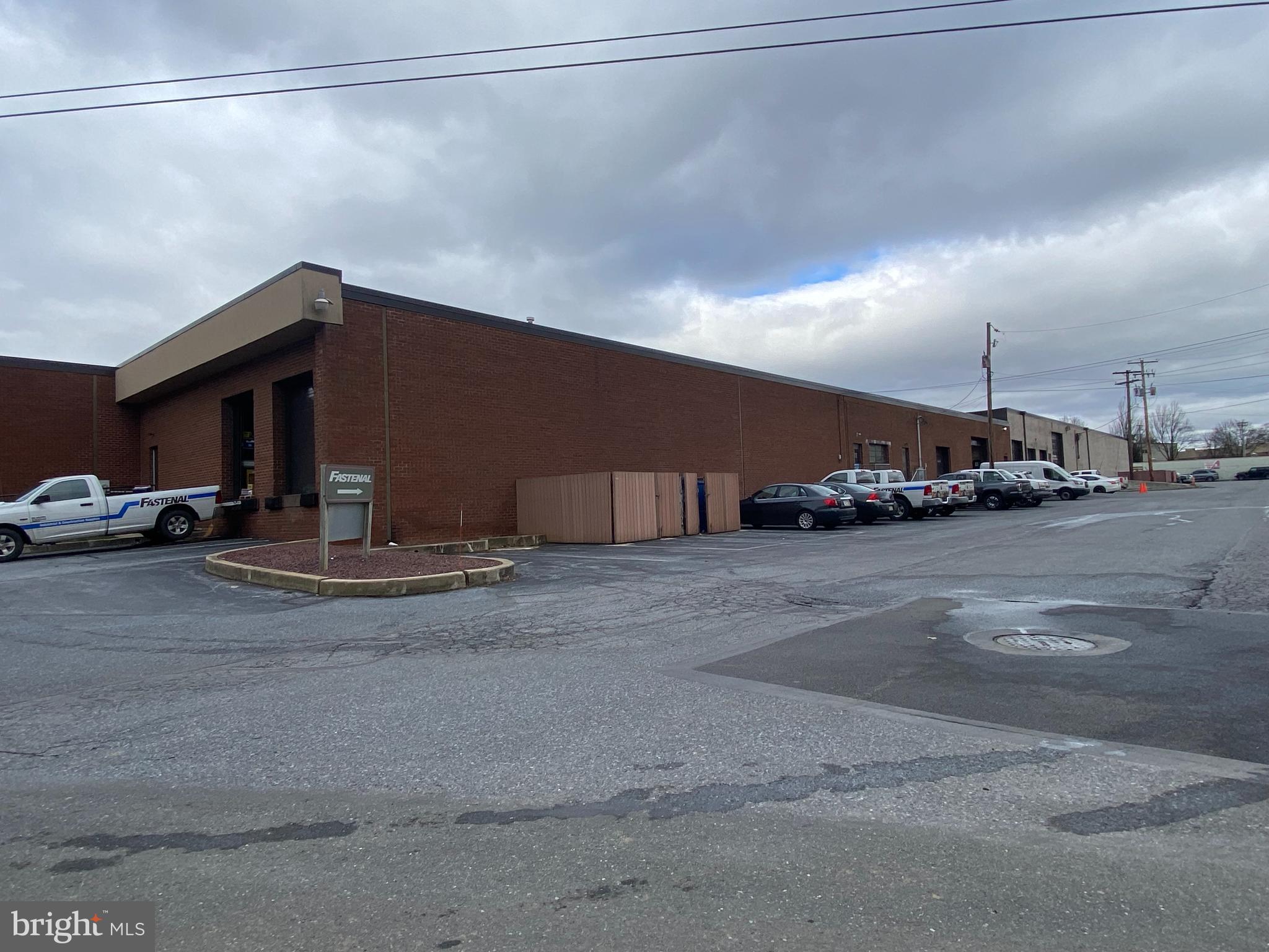 The industrial property located in Greenfield West - Lancaster, Pennsylvania, boasts a prime location within a bustling indurtrial district. Spanning across the property's landscape is a spacious 5,000 square foot space, perfectly suited for various industrial endeavors. With its sturdy construction and functional layout, the building offers ample space for manufacturing, warehousing, or distribution operations. Situated within close proximity to major transportation routes, including highways and railways, the property facilitates seamless logistics and accessibility. Additionally, the surrounding area is populated by a diverse range of businesses, fostering opportunities for collaboration and networking. Whether seeking to establish a new industrial venture or expand an existing operation, this property presents an ideal opportunity in the vibrant location just outside of Lancaster, PA. Efficient flex space  has two dock doors, 14' clear ceiling height, 2,000 SF of office/showroom and the balance is heated warehouse. Easy access for an and off of Route 30. CAM for this space is $1.39 Per SF.