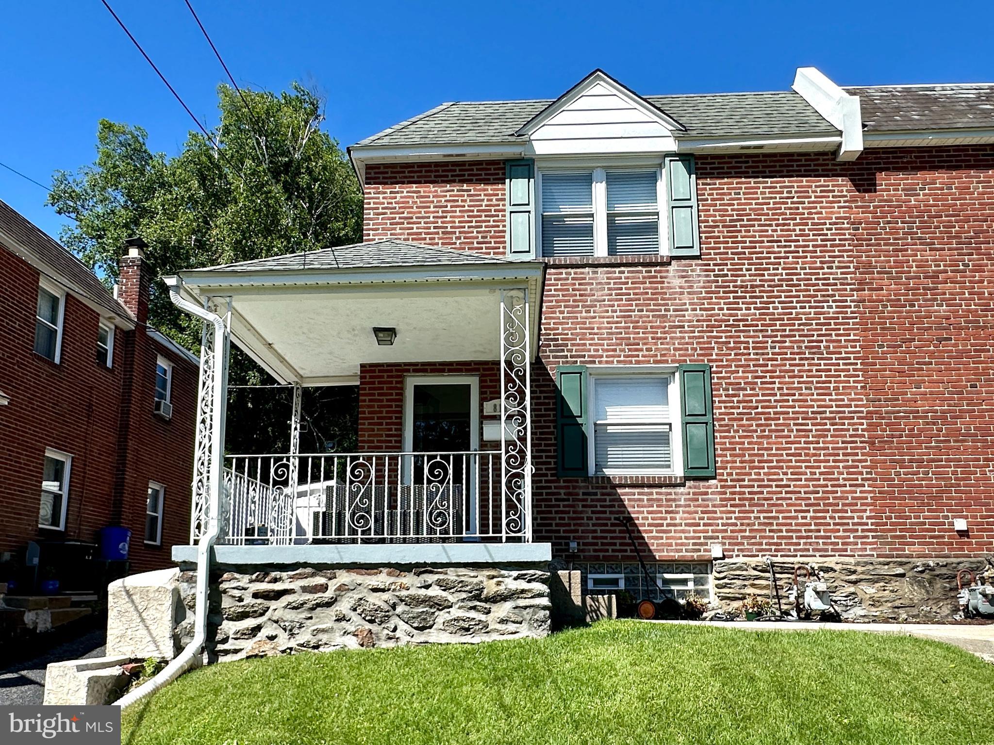 HAVERTOWN, PA - HAVERFORD TOWNSHIP - Stately Brick Twin. Upstairs boasts 3 comfortably sized bedrooms, a renovated ceramic-tiled hall bathroom. Downstairs, you'll appreciate the modern updated kitchen with stainless steel appliances, open to the dining area, and a living room with hardwood floors. There's also a full finished basement with a powder room, a laundry/utility room, plus a bonus room great for a home office! A front covered porch and a rear louvered pergola with canopy make enjoying the outdoors a breeze. PROFESSIONAL PHOTOS  COMING SOON