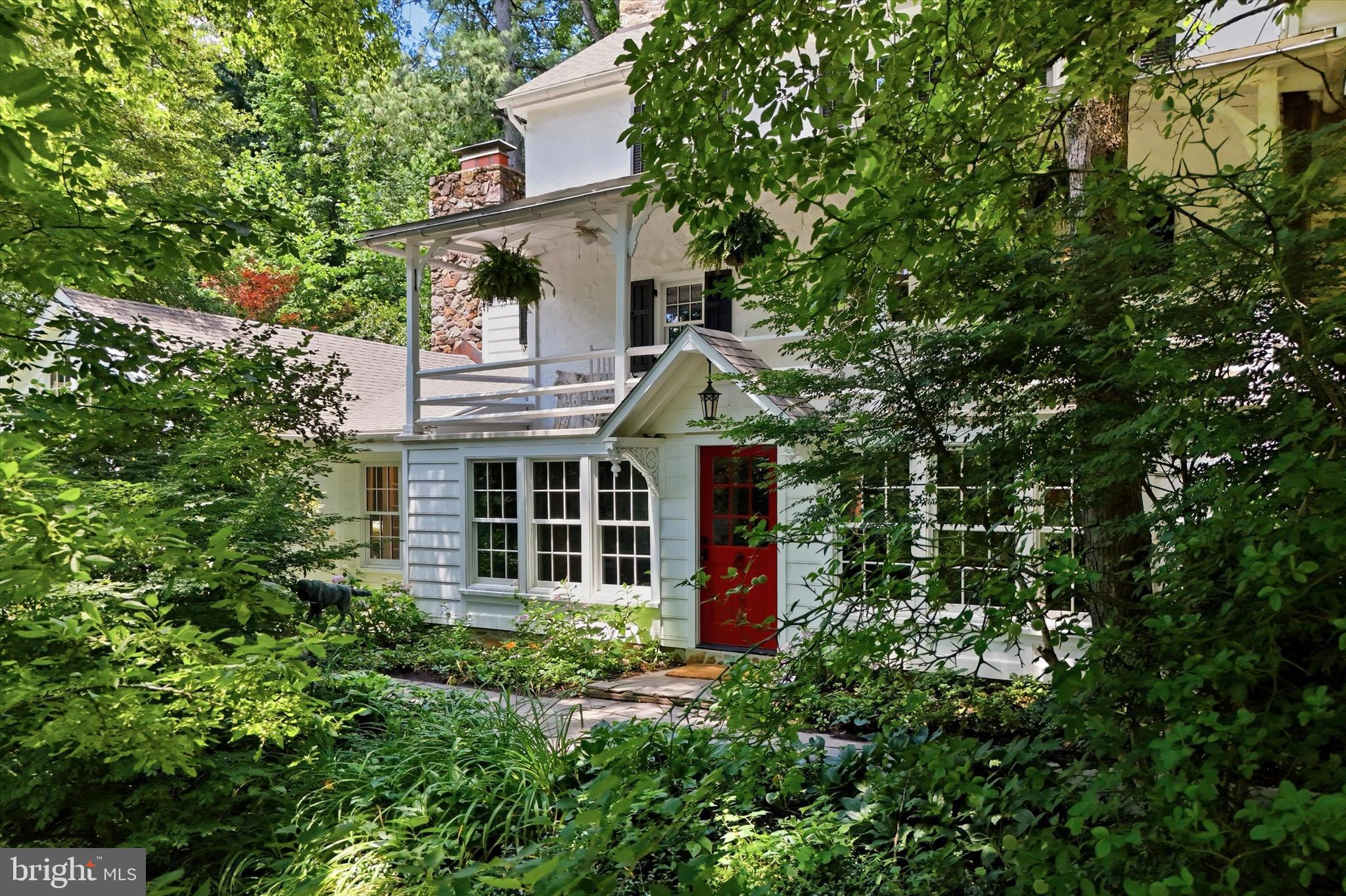 A Truly Rare Opportunity to Own a Historic Estate Rooted in the Earliest Chapters of Chester County History Steeped in the storied past of William Penn’s original 18th‑century land grant, this extraordinary 14‑acre estate is one of the few remaining properties that still carries the quiet dignity of its origins. Once part of the early Bacton Hill freedmen’s community and later owned for 50 years by Philadelphia’s British Consul General, the land itself holds a lineage of resilience, craftsmanship, and heritage that cannot be replicated. Today, the estate stands as a breathtaking fusion of old‑world romance and modern luxury — a fully realized historic sanctuary, meticulously restored with uncompromising craftmanship and vision -reimagined for contemporary living. This is a Generational Property. 

THE MAIN HOUSE:   6000 SQ FT and COMPLETELY RENOVATED is nestled in mature trees, and surrounded by thousands of spring bulbs, and lush perennial gardens. Inside, the home has been transformed through a masterful collaboration between renowned architect Rene Hoffman, the current owner who has a history of renovating historical estates and exceptional Amish craftsmen, who completed the full renovation in 2023. Every room reflects a reverence for the home’s 200‑year narrative: exposed beams, deep stone walls, hand‑finished details, and fireplaces anchoring both the living and dining rooms. The gourmet kitchen is a work of art, designed by a former Michelin‑trained chef who cooked in three‑star restaurants in New York City and the south of France. Professional‑grade appliances, custom cabinetry, copper counters with integrated sinks, and a dramatic 2‑inch walnut island create a space that is both sculptural and deeply functional. A separate large pantry houses additional professional appliances and a hemlock butcher‑block counter. With 5 bedrooms and 4 baths, including two bedrooms that open directly onto the front porch with sweeping views of the grounds, the home offers both intimacy and scale. Marble, French Limestone, Belgian Bluestone and wide-plank pine floors, luxury finishes, and thoughtful architectural details elevate every space. 

THE BANK BARN: CIRCA 1821,  is a LIVING PIECE OF HISTORY WITH MODERN INCOME. The original bank barn has been transformed into two beautifully finished apartments with long‑term tenants generating $5,600/month ($67,200/year) — income that can offset your mortgage while preserving the barn’s historic integrity. 

THE GUEST HOUSE:   300 SQ FT PRIVATE RETREAT is a charming, newly renovated guest house/office which sits tucked away on the property, complete with its own kitchen and bathroom — ideal for visitors, extended family, or a private workspace. 

THE STUDIO / GARAGE:  A FLEX SPACE WITH DRAMA -Set apart from the historic barn and main house, the Studio/Garage was built in 2012 to echo the timeless character of a traditional Chester County bank barn while delivering exceptional modern flexibility. The lower level offers a 1,200 SQ FT garage with its own electric service, generous capacity for three to five vehicles, and abundant storage for the practical needs of estate living.  The 1,200 SQ FT main level has a spectacular open‑layout with soaring 20‑foot peaked ceilings, floor‑to‑ceiling windows,  radiant heated floors, a kitchen area, and a spa‑like bath featuring an oversized rain shower. A secluded 1,750 SQ FT private deck extends from the studio, capturing sweeping views of the estate and creating an extraordinary setting for art, entertaining, creative work, or quiet reflection. 

THE LAND: 14 ACRES+, 3 PARCELS, AND A LEGACY OF PRESERVATION- The estate spans 14+ parklike acres, protected under Act 319, TAXES are Very Low $13,635.  The grounds and location offer many possibilities: equestrian, gardens, space for a pool, privacy and yet close to everything. 

PUBLIC SEWER: Installed in 2026 to support 3 legal residential units.