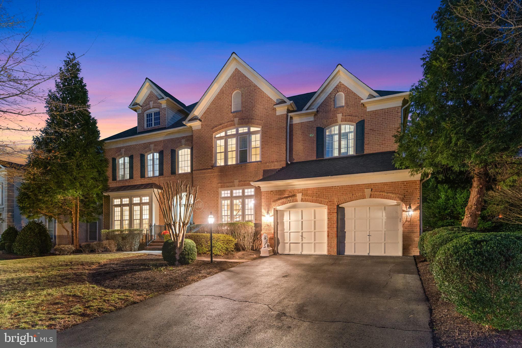 Located in a prestigious gated golf community, this exceptional residence offers nearly 7,000 square feet of finished living space, one of the largest models available in the neighborhood. A grand two-story foyer welcomes you into a beautifully updated interior with custom moldings, new flooring, upgraded lighting, and fresh paint throughout.
The gourmet kitchen features quartz countertops and custom off-white cabinetry, complemented by a newly renovated laundry room, updated dishwasher, and enhanced garage. The primary suite provides a peaceful retreat with a spa-inspired bathroom, while bonus rooms on the main and upper levels offer versatility for a home office, guest suite, or additional living space.
The finished lower level is an entertainer's dream, complete with hardwood floors, a spacious recreation room, custom bar, and dedicated home theater. A large deck extends the living space outdoors, overlooking a private, landscaped backyard with irrigation system.
Positioned on the second row from Lake Manassas, this home offers rare proximity to serene water views while maintaining exceptional privacy. Minutes from Wegmans, premier dining, shopping, and major commuter routes.