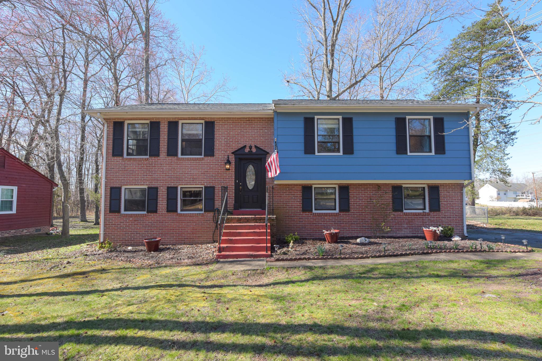 This is the home you were waiting for! It sits in one of the desired flat lots in Aquia Harbour, and it's move-in ready. 4 bedrooms, 3 full bathrooms, spacious kitchen, attached garage and plenty of space to make this place your dream home. Newer water heater, dishwasher, master shower, flooring in the living room, landing, and bedrooms upstairs, washer and dryer.
The walkout level provides easy access to the fenced-in backyard enabling you to grow your own garden during the warmer seasons, or enjoy a good bonfire during the cold ones. What’s more, the property backs to common areas and is conveniently located next to a trail, a playground with plenty of parking space for guests, so if you decide to throw a birthday party you won't have to worry about parking space. Oh! And, you can even watch soccer games from your own backyard! 
The community offers a variety of amenities and activities such as pools, golf course, playgrounds, marina, kayak/canoe launches, walking trails, tennis court, basketball court, dog park, horse stable, and various community events throughout the year. 
Aquia Harbour is minutes from I-95, R-1, Quantico, the historical Government Island, shopping, restaurants, and more! With so much to do, you won't have to go far to have a wonderful time right next to your own home!