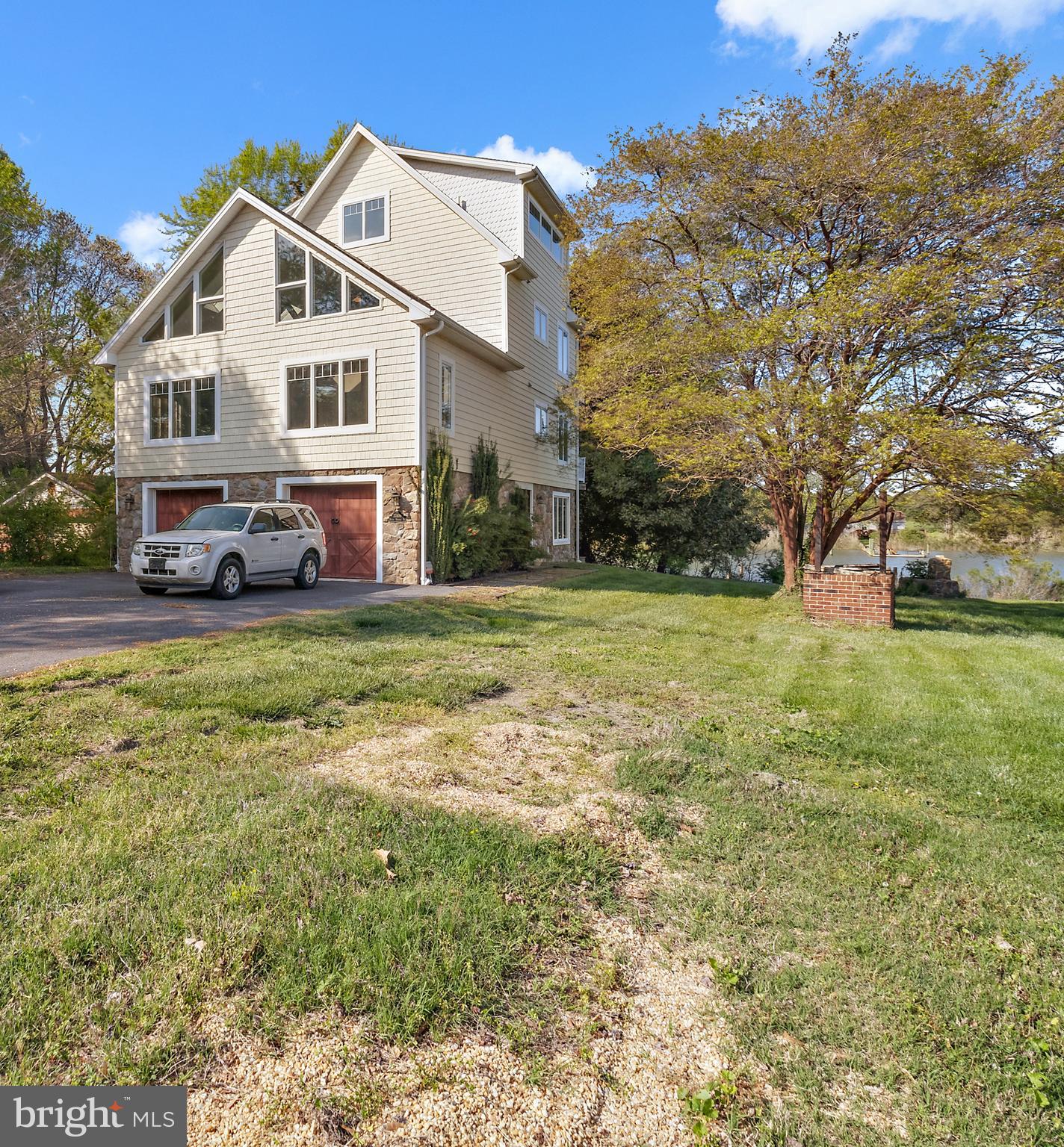 PRICE REDUCED!

Watch the virtual tour!

Amazing custom-built waterfront mansion.  Located in a friendly neighborhood in  Avenue, in the north part of St. Mary's County this stunning home is  convenient to county seat Leonardtown, as well as Waldorf and a reasonable drive to Washington DC.  

The home, with it's tall ceilings, multiple balconies, and dramatic water views features 3 full bathrooms plus an additional "roughed in" bathroom which can be easily finished to add a fourth bathroom.

The large bedrooms can be easily divided into additional bedrooms, if required.

Separate building with fireplace, large windows and water views next to the main house.

The outer walls are Superior Walls; this is a brand name, They have a web site.  They are concrete pre-fab walls.  The wall system is advertised as being flood proof.

There is a two zone HVAC system with two heat pumps.  
The large beams in the ceiling are steel beams covered in wood so that they won't warp.

There is a St Mary's County public dock a quarter mile farther down the road with access to the Potomac River.