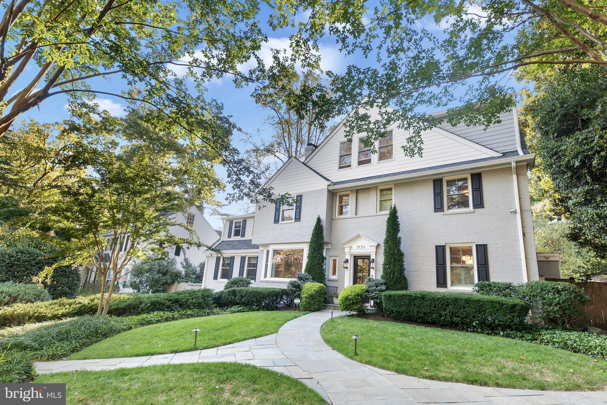 ***IMPROVED PRICE!***  5153 Tilden St NW has everything you would expect from a stately Spring Valley residence: 7 bedrooms and 5.5 baths across 4 levels spanning 5,103 square feet; a large, spectacularly-renovated kitchen; two-car garage and electric car charger; a finished basement with a bedroom and bathroom perfect for an au pair or guest suite, and tons of upgrades including a new roof, new windows and doors, newer HVAC systems, and much, much more. But what you may not fully appreciate when you first see this beautiful home from the street is just how jaw-dropping the back yard is. This home is situated on one of the larger lots in the neighborhood at .41 acres. And every square foot of that is built out in luxury, from the 45' x 18' pool that was renovated in 2024 with new plaster, tile and diving board to the lush side lawn, from the wisteria-covered patio to the heated outdoor living room complete with an outdoor television... you have to see this outdoor space to appreciate just how rare and special this home is.