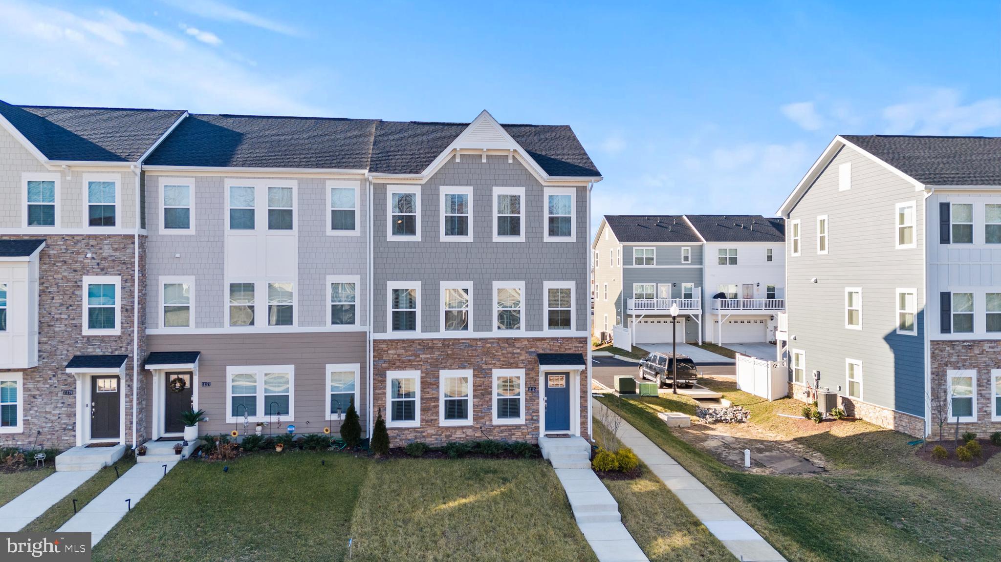This listing is a Short Sale.  Why wait for brand-new construction when this home already shows like a model. Pride of ownership shines throughout this beautifully maintained 2024 end-unit townhome offering 3 bedrooms and 2.5 baths with modern design and thoughtful details at every turn. As an end unit, enjoy added privacy and an abundance of natural light that fills the space.
The open-concept main level features a spacious living area that flows seamlessly into the dining space and contemporary kitchen perfect for entertaining guests or everyday living. Step outside to your private deck, ideal for morning coffee or unwinding in the evening.

Upstairs, you’ll find three generously sized bedrooms, including a comfortable primary suite complete with a walk-in closet and a well-appointed en-suite bath. Additional walk-in closets provide exceptional storage throughout the home.

The two-car garage offers both convenience and extra storage, and with 2024 construction, you’ll enjoy peace of mind knowing the systems, energy efficiency, and finishes are all practically new.

Move-in ready and designed for today’s lifestyle so. don’t miss the opportunity to make this exceptional townhome yours.