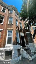 Excellent Investment Opportunity Awaits! Welcome to 1904 Mosher Street, a large home offering grand sized spaces sure to be enjoyed! This is a long-time tenant occupied Property with impressive income potential, currently generating $15,816 in annual revenue. The in-place tenant wishes to stay on and is currently paying $1,318 monthly. Access for showings are based on friendly tenants schedule usually within 24-48 hours- but will do best to accommodate. This home offers 5 large bedrooms on the upper levels and has had a recent comprehensive renovation with a newer HVAC system, roof, kitchen, and updated bath on 4 levels which offer many charming architectural details including a beautiful staircase with original bannisters, a large sky light at the top landing, transom windows, and exposed brick walls. There is ample storage space in the basement which could be finished off for additional living space. The backyard features a fenced area and parking pad for hassle-free off-street parking. The location offers ease of convenience to major travel routes and downtown at an excellent price point. Buyer is responsible for verifying ground rent. This property is ideal for those seeking a solid investment opportunity in a great location! FIRST TIME HOME BUYERS HAVE UP TO 50K IN GRANT MONEY.  CALL SONG HONG LISTING AGENT.