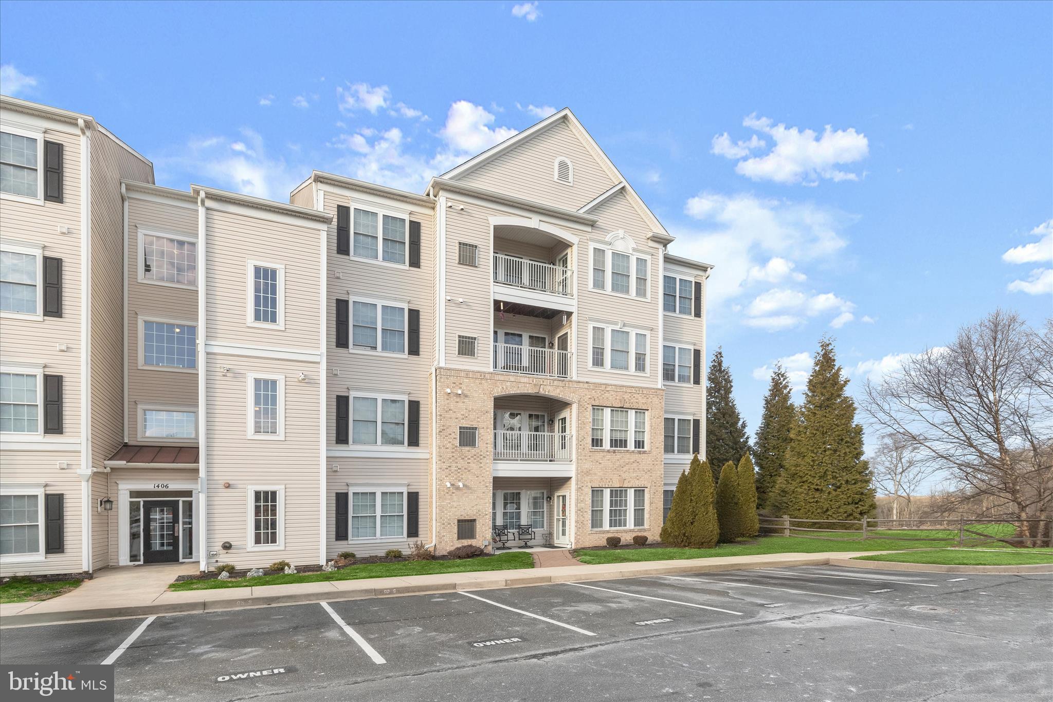 Refined finishes, abundant natural light, and effortless living define this beautifully updated two-bedroom, two-bath condo in the 55+ community of Joppa Forest. A welcoming main entrance with elevator access leads to the fourth-floor landing, where tasteful décor and comfortable seating create an inviting space for casual gatherings with neighbors.

Step inside Unit R and you are immediately drawn to the elegant millwork accents, modern lighting package, serene color palette, and bright, airy atmosphere. The spacious dining area flows naturally into the sunlit living room, enhanced by newer plush carpeting and an open, comfortable layout. The updated kitchen blends style and functionality, featuring LG stainless steel appliances including an upgraded double wall oven, refrigerator, gas cooktop, granite countertops, and a pantry. Natural light fills the adjoining breakfast nook and library nook, offering ideal spaces for morning coffee, reading, or quiet reflection.

Step out onto the private balcony to enjoy fresh air and gentle breezes.  Designed with privacy in mind, the bedrooms are thoughtfully positioned on opposite sides of the unit. The primary bedroom suite offers a tranquil escape with a walk-in closet and private en suite bath, while the second bedroom is bright, comfortable, and well suited for guests or a home office.

A dedicated laundry room with a full-size washer and dryer, along with additional storage, completes the interior. Numerous upgrades provide lasting value and peace of mind, including new community roofs installed in 2024, a water heater replaced in 2023, an Aquatherm heating and air conditioning unit installed in 2022, kitchen appliances updated in 2020, and carpeting added in 2020.

Residents enjoy a warm, close-knit community atmosphere with a clubhouse that includes a gym, meeting room, event center, and an inviting patio. Conveniently located near shopping, dining, and I-95, yet tucked into a quiet setting, this pristine condo offers comfort, convenience, and a lifestyle that truly shines.