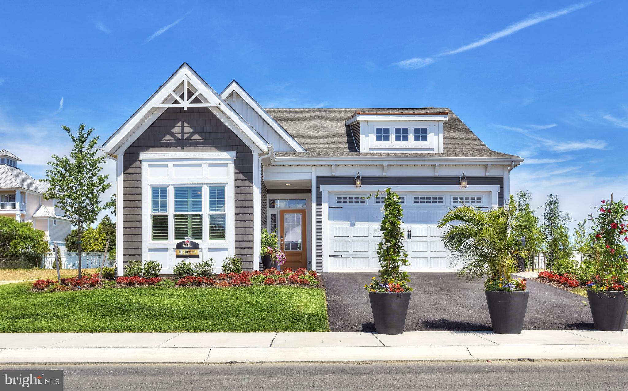 LAST Chance to build in the Peninsula. Only four lots remaining! Ask about the current builder incentives! Introducing Still Waters neighborhood in the Peninsula. The Orchid is a 3 -4 bedroom, 2 -3 bath ranch home starting at 1,567 -3,250 square feet. This floor plan has everything on the first floor, including an open great room, kitchen, and dining area. Options are available to personalize this home, including a second floor, screened porch, sunroom, luxury owner's suite, and outdoor patios. Basements available. Lot premiums may apply. On-site salespersons represent the builder/Seller.