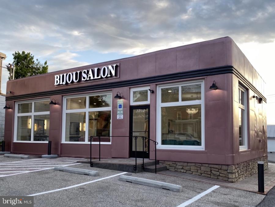 High end operating salon business including commercial building! Fully permitted gut renovation in 2020. Great road frontage at busy intersection including Sheetz and Millers market, lighted building and road signs, 16 parking spaces, high end ERV (Energy recovery ventilator) system, new thermal store front windows, 400 amp electric, designer lighting including recessed, sconces and chandeliers, built-in speakers throughout, two looped water heaters, entry ramp, alarm system, new roof and LVP flooring, The building features an entry area with seating, textured tiled wall, custom display shelving and desk with stone top, remodeled bathroom with herringbone tiled wall, main area with shiplap, custom wall art, shampoo area, drying area, 9 stations, high ceiling and exposed beam, manicure/pedicure area with 2 custom nail stations with ventilation and 2 high end pedicure chairs with shiatsu massage, esthetician/flex room with sink, employee area with washer/dryer, storage and triple sink and a partial basement with storage. This building and business are turn key and one of a kind!
