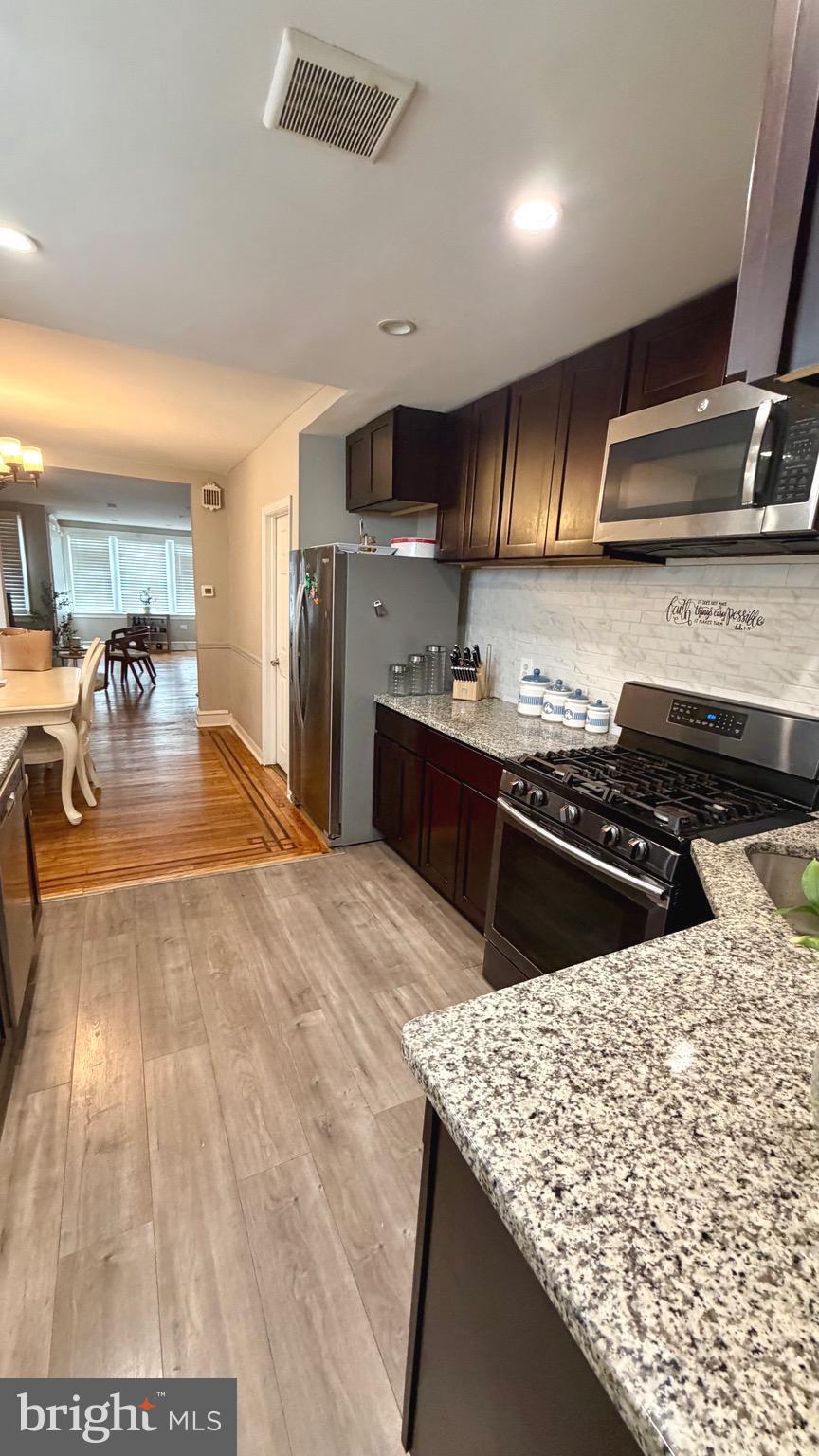Come see this beautifully updated row home in Lawncrest neighborhood of Philadelphia! When entering the large living room you will notice the shiny wood floors, freshly painted walls, and lots of natural light. From the living room enter into the kitchen with gorgeous new wood cabinetry, stainless steel appliances,new floors, and lots of counter space. Upstairs you will find 3 bedrooms that have all been freshly painted in neutral colors with gorgeous wood floors and finish basement All. this home needs is you! Make your appointment today! Welcome Home!