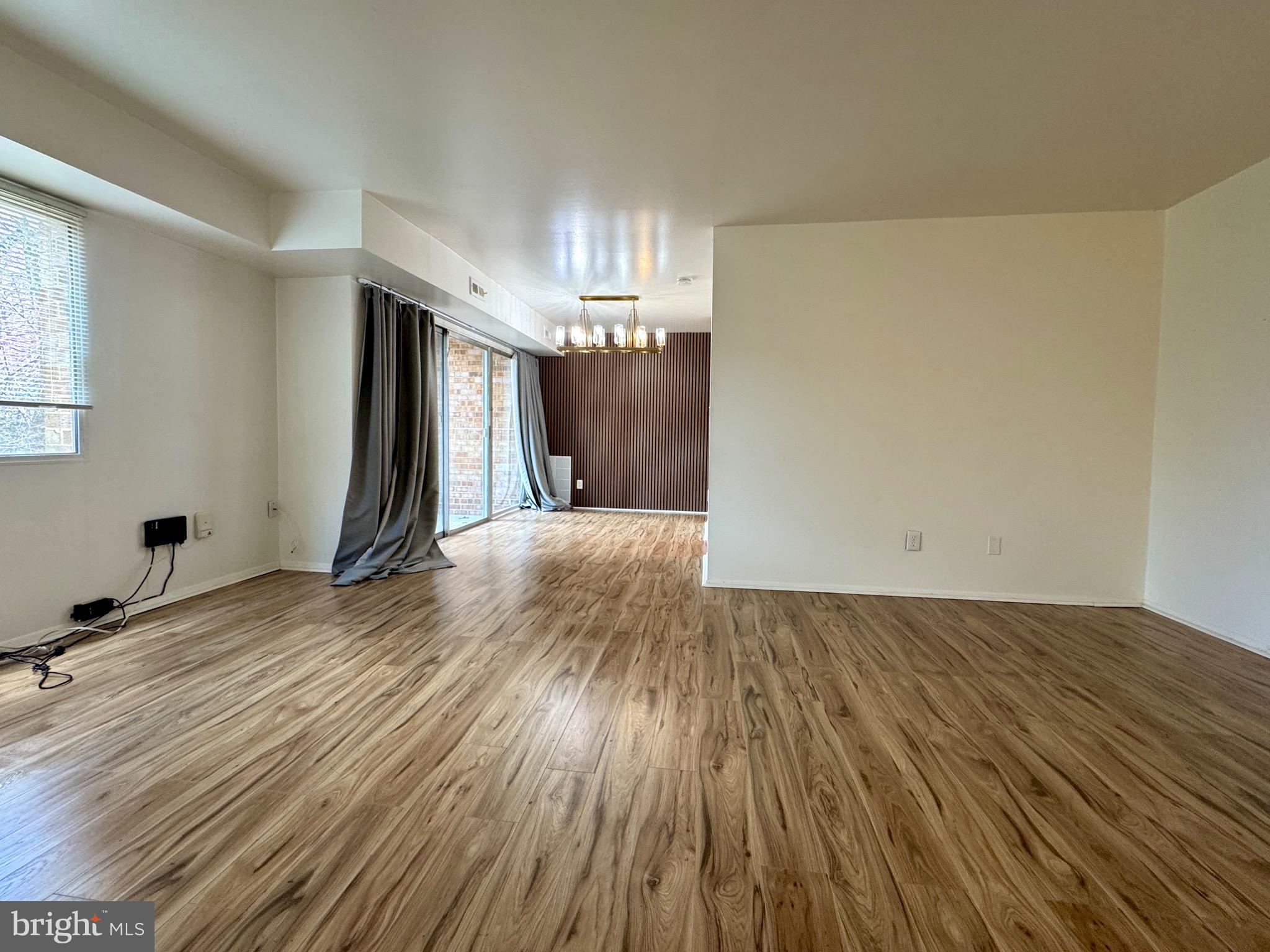 This bright and renovated one bedroom plus den and one-bathroom condo is perfect for entertaining or unwinding after a long day.
Say goodbye to monthly utility bills! The condo fee covers ALL utilities, including electricity, gas, heat, water, and trash removal. No washer/dryer in unit but there is a common laundry room on the ground floor. Enjoy the convenience an unassigned parking space, plus a guest pass for visitors.
This condo is across the street from the vibrant Mosaic District where you'll have access to an array of trendy shops, restaurants, and entertainment options.
Just minutes away from Merrifield, Dunn Loring, and Tysons Corner.  Easy access to major commuter routes, including I-495, Rt 50, Gallows Roadd, 1-66, and Rt 29. Various shopping and dining options  just moments from your doorstep.