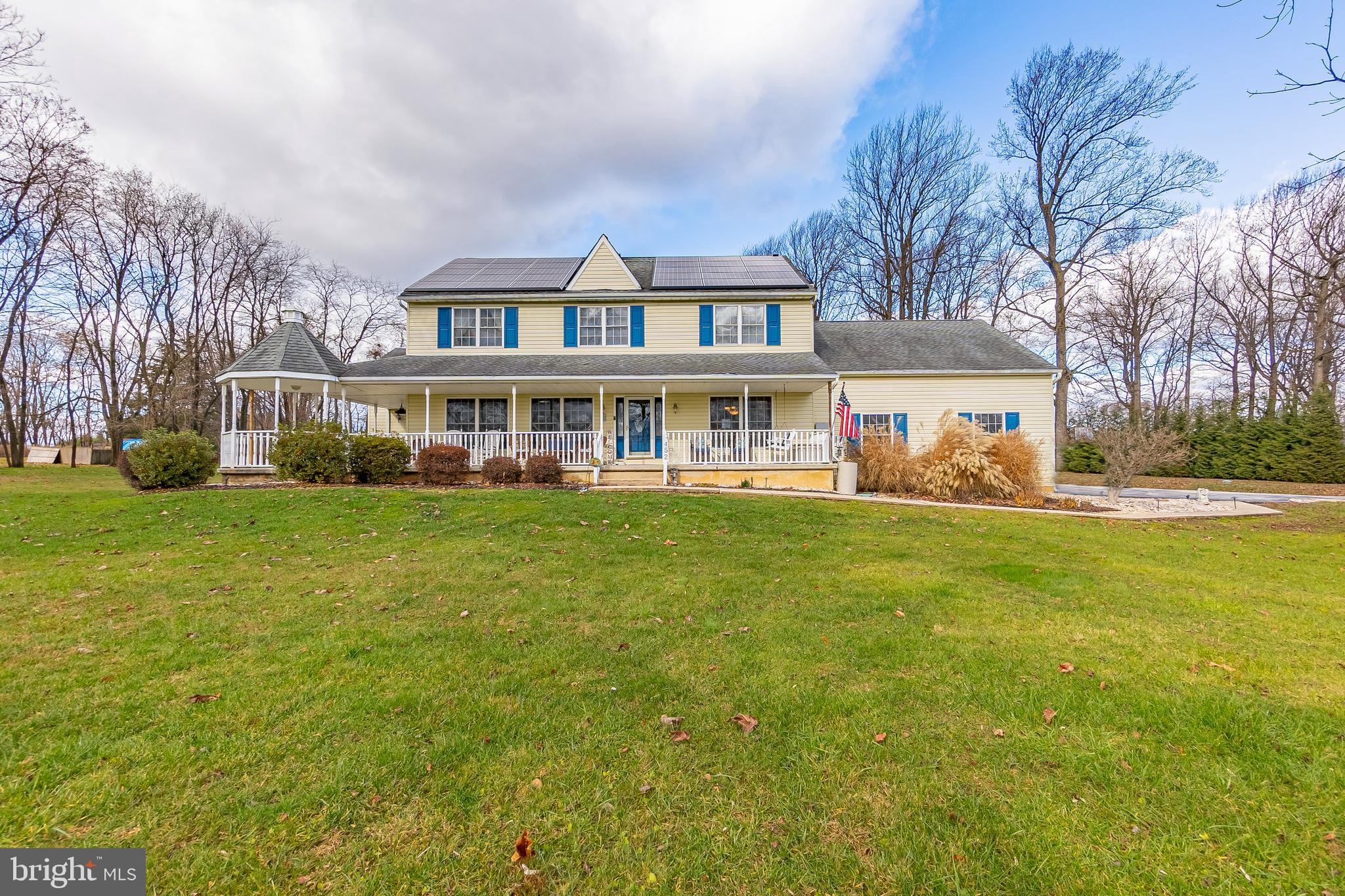 Welcome to 452 W. Avondale Road, a charming 4-bedroom, 2.5-bathroom single family home nestled in the heart of West Grove. As you approach the home, you are greeted by a welcoming wrap-around porch that sets the tone for the warm atmosphere within. Step through the front door into the impressive foyer, where the open layout seamlessly connects the living and dining room area, creating a space that is perfect for both entertaining and everyday living. Continue into the spacious, renovated kitchen, featuring recessed lighting, desirable white cabinets, marble countertops, a stylish tile backsplash, a convenient peninsula with bar seating and a breakfast room with access to the back deck. The adjacent great room boasts large windows that flood the space with sunlight, creating a bright and airy environment. A powder room and convenient access to the 2-car garage with lofted ceiling for ample storage space, completes the main level. Upstairs, discover the tranquility of the primary bedroom and en-suite with double sinks and jetted tub, offering a private retreat after a long day. Three additional bedrooms and a well-appointed hall bath provide ample space for family and guests. The professionally finished walkout basement expands the living space and offers versatility for various needs. This lower level includes a family room, an office, a laundry room, and additional space that can be customized to suit your lifestyle and preferences. Situated on a sprawling 2.2-acre property with a private tree-lined perimeter, this home offers a sense of seclusion and tranquility. Enjoy outdoor living with an above-ground pool and new patio providing a perfect oasis for relaxation and recreation. Some additional upgrades include a whole house generator in 2021, new HVAC system, solar panels, and 2 drainfields. This property is located within the highly regarded Avon Grove School District, making it an ideal choice for families. Beyond the property lines, take advantage of the great location close to shopping, dining, local attractions, and more. Don't miss the chance to make this your dream home!