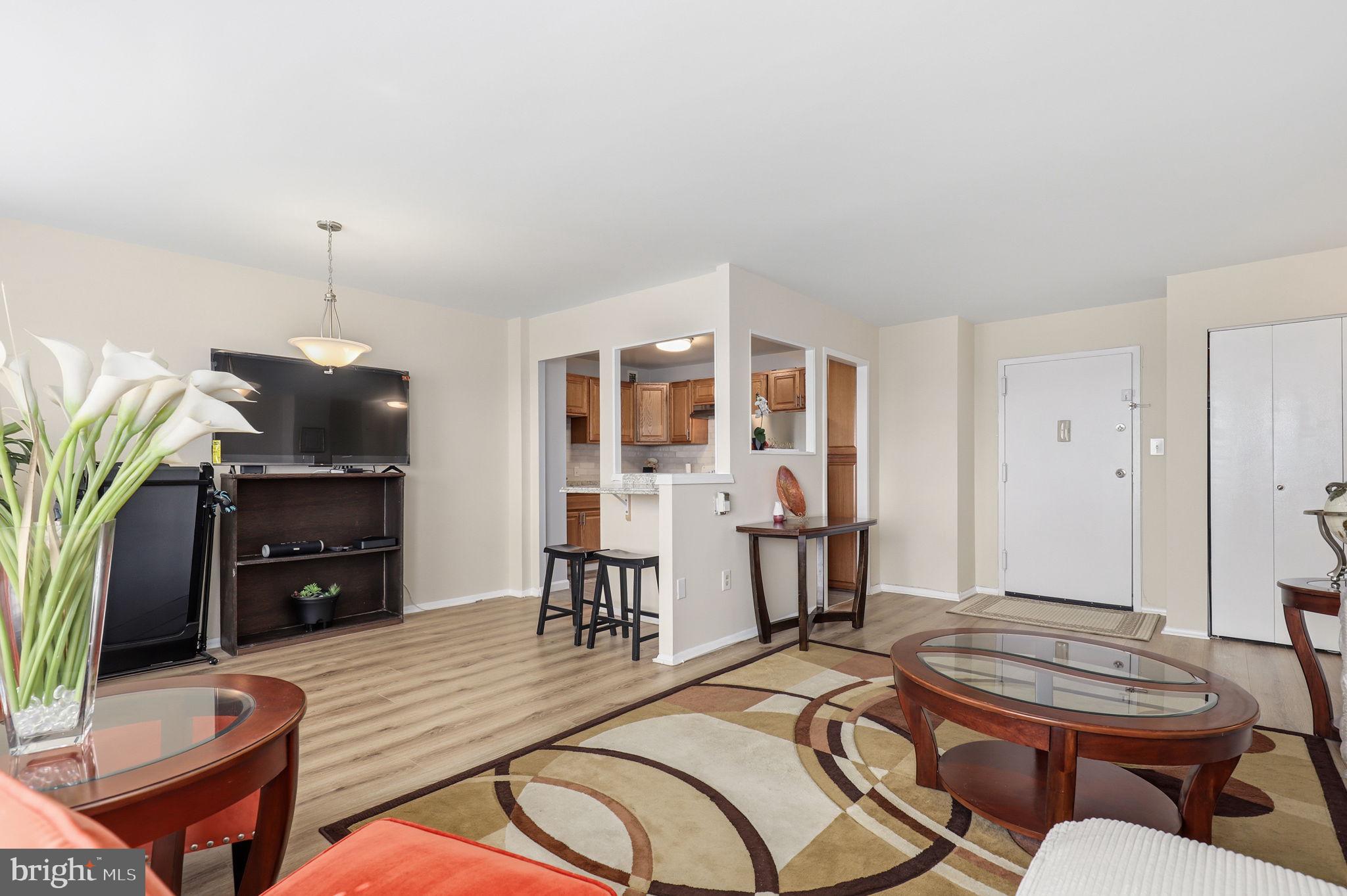 Incredible condo located in the highly sought-after University Towers Condominiums! This beautifully updated 1-bedroom, 1-bath residence offers the perfect combination of comfort, convenience, and value. The spacious eat-in kitchen features granite countertops, ample cabinetry, a stylish tile backsplash, and tile flooring, making it both functional and inviting.
The generously sized bedroom includes an oversized closet, while luxury vinyl plank flooring flows throughout the home. Freshly painted and filled with abundant natural light, this move-in-ready condo offers a bright and welcoming atmosphere.

The condo fee includes all utilities, providing exceptional value and hassle-free living. Residents enjoy an impressive array of amenities, including an outdoor swimming pool, tennis courts, a party room for entertaining, secured building access, an on-site lobby receptionist, and beautifully maintained common areas.

Ideally located just moments from shopping, restaurants, public transportation, Metro, major commuter routes, schools, and recreational facilities. Nature lovers will appreciate being just a short walk from Sligo Creek Park, where miles of scenic trails, playgrounds, picnic areas, and outdoor activities await. This is an outstanding opportunity to own an affordable, low-maintenance home in one of the area's most convenient and desirable communities.