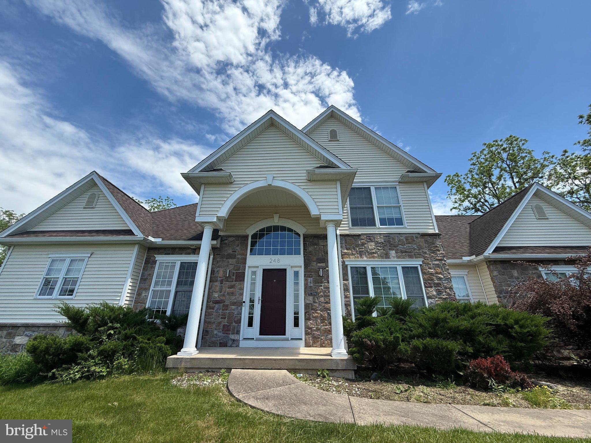 Discover the charm and sophistication of this architect‑designed two‑story home, perfectly situated in the highly desirable Stearns Crossing community. Set on a private 0.8‑acre cul‑de‑sac lot, this stunning residence offers 4 spacious bedrooms and 3.5 baths, along with panoramic views and beautifully landscaped surroundings.

A gracious two‑story foyer welcomes you into an open, light‑filled floor plan. The formal living and dining rooms feature 9‑foot ceilings, while the family room impresses with cathedral ceilings, abundant windows, and a cozy gas fireplace. The heart of the home is the inviting eat‑in gourmet kitchen, complete with ample white cabinetry, granite countertops, and a bright breakfast area. Sliding glass doors lead to the private, flat backyard—ideal for entertaining, alfresco dining, or enjoying peaceful mornings.
The first‑floor owner’s suite provides a true retreat, offering two closets, a double‑sink vanity with makeup area, a Jacuzzi tub, and a separate shower. Upstairs, you’ll find three additional bedrooms, a loft, and a full bath.

A fully finished walkout basement—approximately 1,020 sq ft—adds even more versatility, featuring a third full bath and ample space for recreation, hobbies, or guests. Just a few finishing touches remain to make it your own.

Enjoy breathtaking sunsets and sweeping views of Beaver Stadium and downtown State College from this exceptional property. With an attached garage, plentiful storage, professional landscaping, and access to nearby parks, excellent schools, and community amenities, this home offers the perfect blend of comfort, elegance, and convenience.
Experience the lifestyle you’ve been dreaming of in Stearns Crossing.