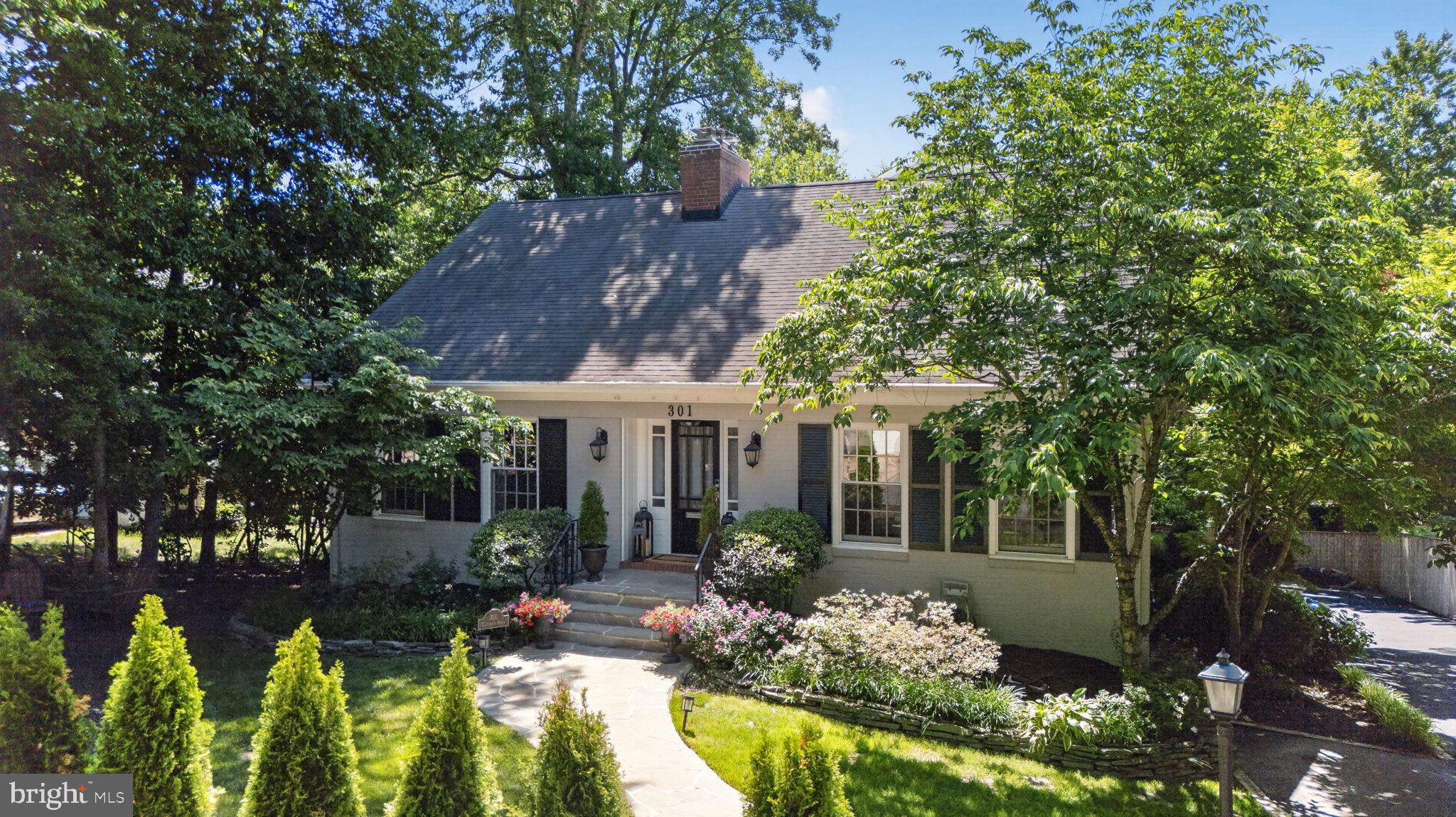 Some homes surprise you. This one astonishes.

From the street, 301 Columbia Drive offers a hint of what’s inside. Step through the front door and discover over 5K square feet of beautifully scaled living spaces, six bedrooms, and the kind of thoughtful layout that’s increasingly rare in Alexandria.

Nestled in sought-after Jefferson Park, this 6-bedroom, 3.5-bath residence effortlessly balances elegance, comfort, and everyday livability. Whether hosting a holiday gathering for 20+  or enjoying a quiet evening by the fire, every space feels designed for living well.

The main level unfolds with a gracious formal living room, an impressively sized dining room ready for your largest celebrations, and a beautifully appointed kitchen featuring upgraded countertops, a 48-inch Wolf range, Sub-Zero refrigerator, abundant cabinetry, and a charming built-in banquette that invites lingering over morning coffee.

The spacious family room, anchored by a fireplace, opens to a private deck surrounded by mature greenery, an ideal backdrop for outdoor entertaining, al fresco dinners, or simply unwinding at the end of the day. A main-level bedroom offers flexibility for guests or a sophisticated home office, while a powder room completes the floor.

Upstairs, four spacious bedrooms and two full baths provide room for everyone. The primary suite serves as a true retreat, featuring vaulted ceilings, a walk-in closet, and the sense of privacy every homeowner craves.

The lower level offers remarkable versatility with an expansive recreation room, oversized laundry room, and a private bedroom with en-suite bath, perfect for long-term guests, an au pair, multigenerational living, or the teenager who insists on “needing their own space.”

An oversized garage and rare walk-in storage room provide the practical luxuries that make everyday life easier.

And then there’s Jefferson Park, a neighborhood where neighbors become friends, block parties are still a thing, lemonade stands appear on warm afternoons, and community feels refreshingly authentic. Enjoy easy walks to parks, George Mason Elementary, and St. Stephen’s & St. Agnes Lower School, while remaining just minutes from Del Ray, Old Town Alexandria, and Washington, D.C.

Because sometimes the most extraordinary homes are the ones that keep their secrets until you step inside.