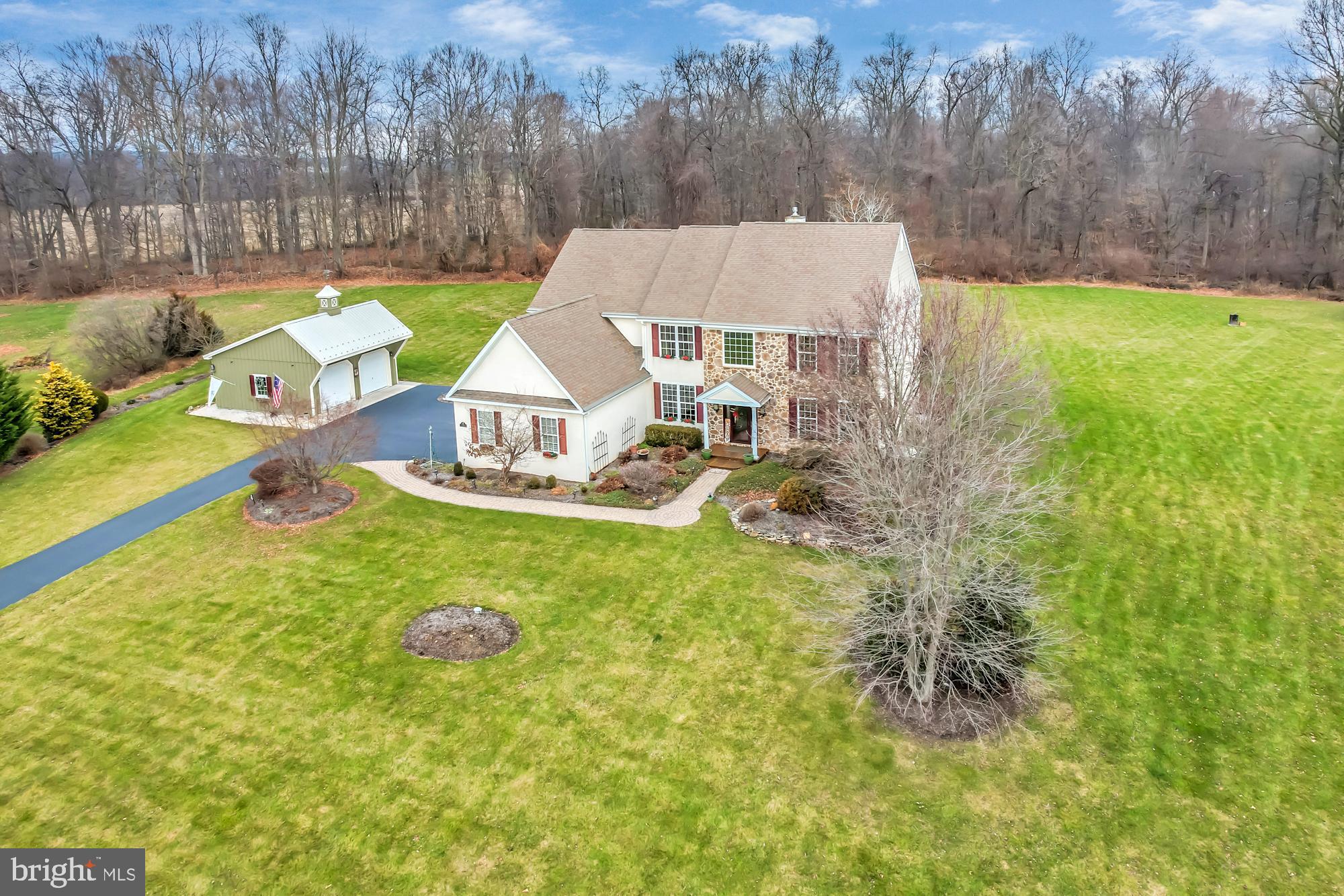 Welcome to 236 Huntsfield Drive. This meticulously maintained home on 2 gorgeous professionally landscaped acres offers an abundance of privacy & breathtaking views while seated on the premier lot of Huntsfield. The upgrades & features throughout this home are both vast & strategically designed to create maximum luxury and affordability through a combination of both energy-efficient & maintenance-free highlights. A few upgrades that will undoubtedly stand out are kitchen & 2 bathroom remodels, the addition of a 24X24 detached farmhouse garage, upgraded systems throughout (Reme- Halo heating system, well upgrade, new fireplace & mantel, custom his & her closets, replaced exterior siding, maintenance free hardscaped rear patio,  hot water heater, gutter guards & the addition of a whole house generator & surge protector to name a few). Newer hardwood floors & carpet throughout make this home ideal for anyone looking to move right in! This home resides in an ideal location allowing quick access through major roads to Downingtown, Chester Springs, West Chester, Phoenixville and Reading. This home's value, numerous features, beautiful property and prime location provide a truly rare opportunity and is a must see! Schedule your showing today! (Please see the attached detailed list of features & upgrades. A pre-listing home inspection was done in December 2023 & is available upon request!)