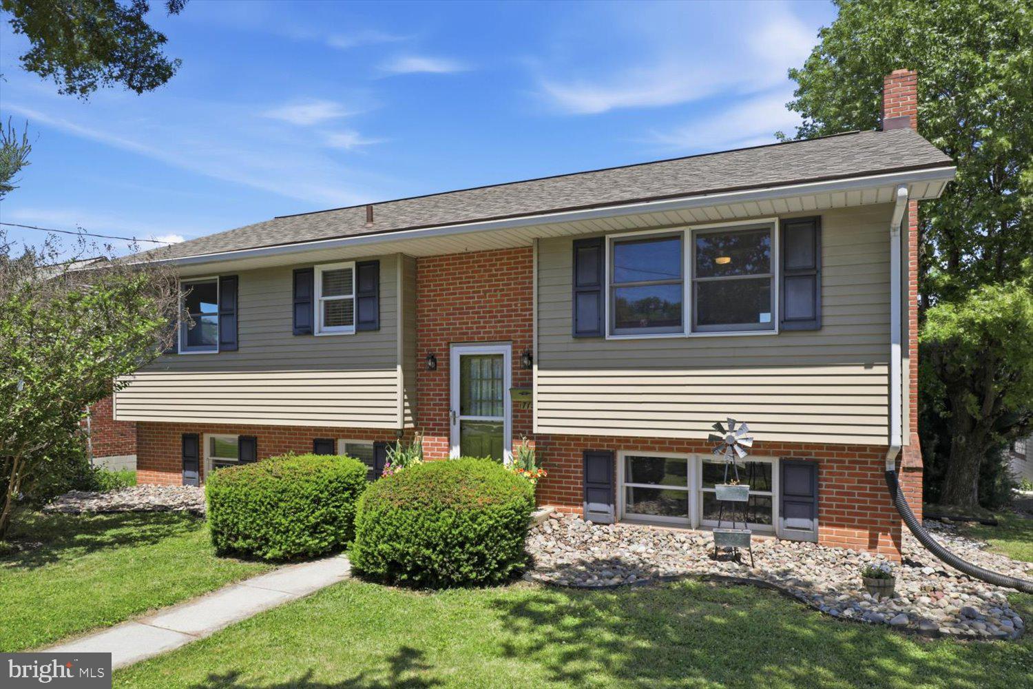 Welcome Home to 715 Center Ave, a 3-bedroom, 2 Full bathroom - bi-level home offering comfortable living space, functional design, and a convenient Ephrata location. The open-flow layout provides flexibility for everyday living and entertaining, with a spacious eat-in kitchen serving as the heart of the home. Multiple living areas offer room to gather, relax, or work from home, while the lower level family room showcases a brick fireplace with wood stove that adds warmth and character.

Step outside to the rear deck, providing space for outdoor dining, morning coffee, or evening relaxation overlooking the backyard. The detached 2-car brick garage offers valuable storage, hobby space, or workshop potential, a rare find in this location in Ephrata + 2 additional off street parking spaces in front of the garage. 

Recent updates include a newer roof, french drain, new carpet, paint, new electrical panel, ceiling fans added and new lvp floors! 

Located just 0.2 miles from the Warwick-to-Ephrata Rail Trail, this property provides easy access to miles of walking and biking opportunities. The Ephrata Public Library is only 0.3 miles away, and Ephrata High School is approximately 1 mile from the home.

 Enjoy being minutes from local coffee shops, cafés, restaurants, shopping, parks, and the businesses and services of downtown Ephrata. Convenient access to major commuter routes adds to the appeal of this well-located Lancaster County property.