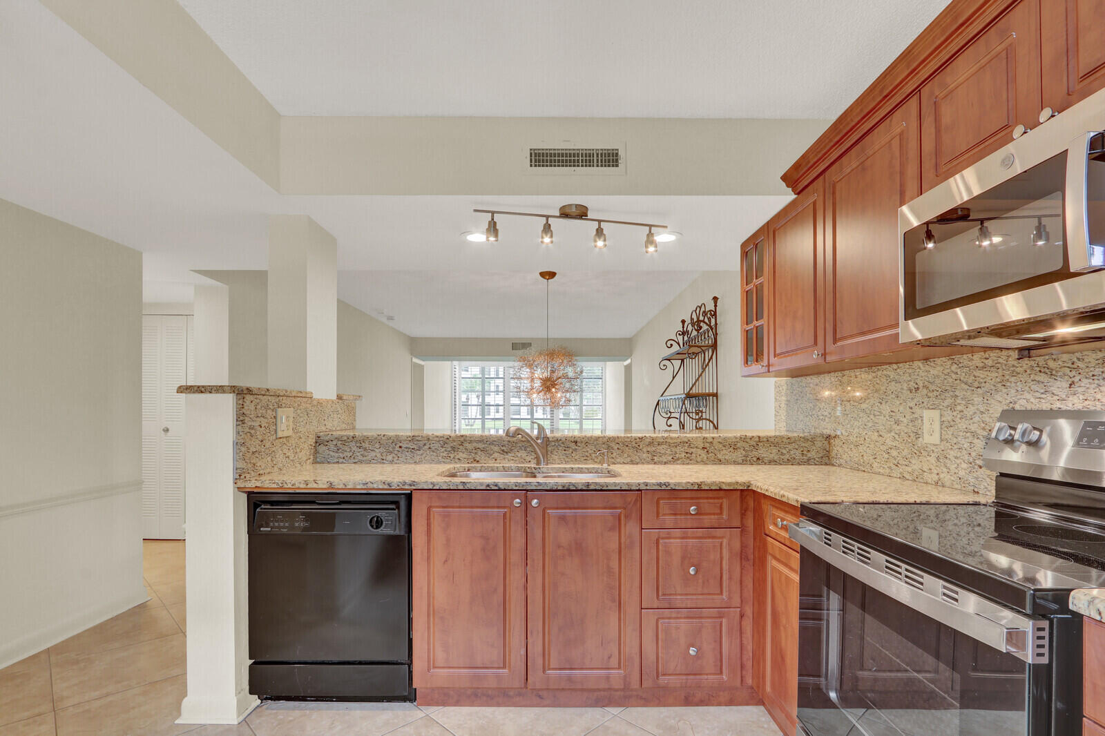 Move-in ready first floor unit, just steps from the porte-cochère. Boasting a new AC, water heater, refrigerator, stove, microwave, disposal, washer and dryer this updated unit is freshly painted with tasteful Bahama shutters and light fixtures. This is a lovely quiet garden view unit, gated and centrally located in town.