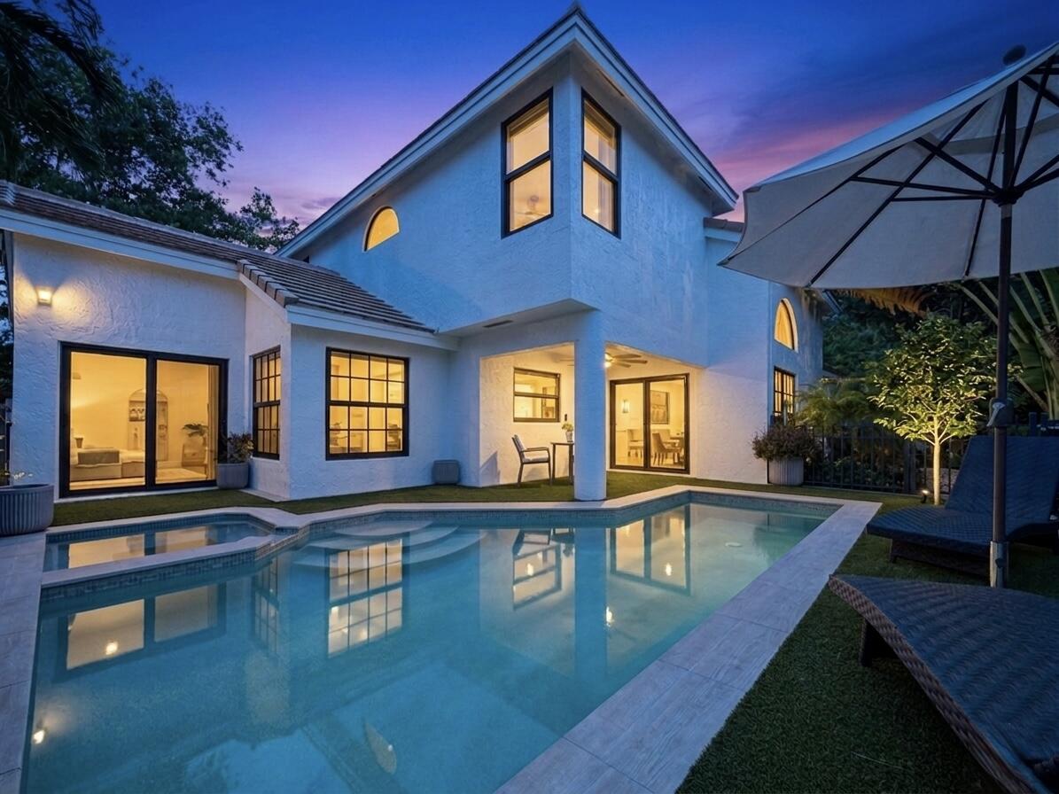 Turnkey waterfront Luxury in Gated community of Sherwood Forest, central Delray Beach. Fully renovated in 2022, this 3BR/2.5BA, 2,160 sq ft hidden gem perfectly balances resort-style living with ultimate peace of mind.  Premium Upgrades: New roof (2024),  impact windows/doors, whole-house generator, and 2022 AC/ 2024 ductwork, open-concept chef's kitchen.  Outdoor Oasis: A freshly renovated 2025 heated saltwater pool & spa overlooking serene waterfront views—  Layout: Main-level primary suite with luxury bath; 2 upstairs bedrooms with a Jack & Jill bath. Low HOA covers lawn care, cable, security, and clubhouses with pickleball/tennis. Minutes from Atlantic Ave, beaches, dining, and the new $33M public golf course. Top-rated schools nearby! *New Roof: Brand new roof installed in 2024. *Wind Protection: Complete hurricane impact windows, doors, and garage door. *HVAC System: replaced in 2022 and all-new ductwork 2nd floor in 2024. *Power Protection:  Whole-house generator included. *Pool: 2025 Salt water filter system * LOW HOA: $333 monthly verses $795 monthly for neighboring community, The Enclave   Interior Renovations *Major Remodel:  Comprehensive major home renovation completed in 2022. *Chef's Kitchen:  Completely brand new kitchen featuring an updated, modern open-concept layout. * sauna in the garage can be included for an additional. $4500 (does not Convey)   *Architectural Details: Vaulted Ceilings and contemporary stair rails.