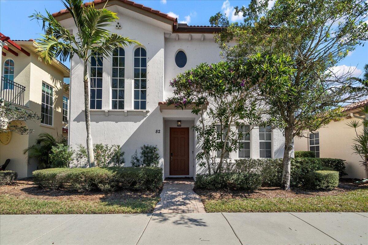 Property is Vacant, Repainted, and Ready to Show!! Seller is Motivated! This two-story residence features 4 bedrooms, 4 full bathrooms, and a 2-car garage, ideal for those searching for spacious and sun filled. The home opens to a dramatic great room with soaring 21-foot ceilings, creating an elegant, light-filled atmosphere. The open-concept design flows seamlessly through the living, dining, and kitchen areas. Glass doors extend the living space to a private outdoor patio, perfect for entertaining or quiet relaxation. Residents enjoy resort-style amenities, including a clubhouse, fitness center, pool, and beautifully maintained grounds, just minutes from our world renowned beaches, golf, dining, and shopping experiences.
