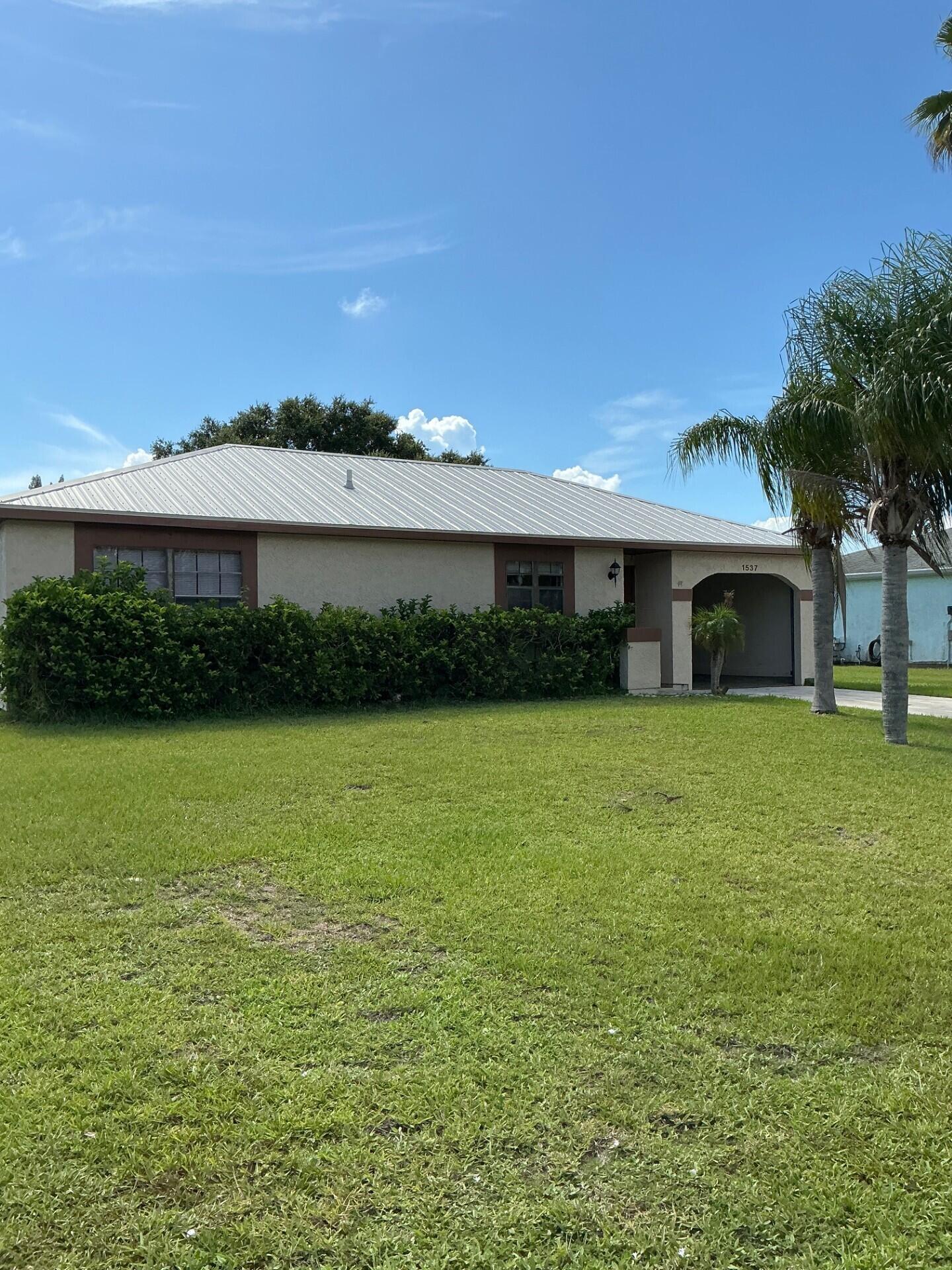 Single family rental home located East of US 1 off Walton Rd offers a practical 2-bedroom, 1-bath floor plan with tile throughout for easy maintenance. The kitchen is equipped with refrigerator, stove and dishwasher for everyday convenience. Located in Port St Lucie, FL, this residence provides straightforward, low-maintenance living in a convenient location. To qualify the household income must be least 3 times the monthly rent . The application fee is $75 per person aged 18 or older. Once approved there is $125 fee with the first months rent and security deposit due.  RentSpree and Zillow applications will NOT be accepted. All households are enrolled in the Resident Benefits Package (RBP) for $39.95/month. More d Resident Benefit Package includes Air Filters Shipped Directly to your Front Door! Changing filters, a known tenant responsibility, is now as easy as opening the front door. For our properties with HVAC, we've made every effort to ensure your obligation to change the filter(s) is as easy as possible by having them delivered to your door approximately every 60 days or as required by your system. This helps you save up to 250/year, improves indoor air quality, and reduces the hassles and liability of repairs. - Resident Rewards Program! We celebrate every chance we get! Now, you'll be rewarded for paying your rent on time and earn rewards for gift cards along with substantial savings when shopping in the Piñata online marketplace. In the days ahead, you will receive a welcome email from Piñata - simply download the app to your smart device using the link included in that email and earn points just for signing up! - Renters Insurance! You'll benefit by being added to our master insurance policy, so all of your lease requirements are met. We've secured the industry-leading value policy from an A-rated carrier. *Tenant has the option to provide proof of insurance as required by terms of lease, provided by 3rd party vendor. - Credit building! Now you can build your credit by renting too! Boost your credit score each time you pay rent on time. (We can retroactively report to the credit bureaus up to 24 months) - Identity Protection! 1M for all adult leaseholders complete with a US-based Identity Restoration Specialist. - Utility Concierge! If you're interested in changing your internet or cable providers, but don't want to make time for the dreaded hold times to discuss your options with variable companies, our Utility Concierge Service will turn this hassle into a simple 10-15 minute conversation. - Home Buying Assistance! When you are ready to buy your "forever" home, we want to help! - Convenient & Easy to use Online Portal! Pay your rent online, access documents and submit those maintenance requests any time, 24/7. We know life is busy, so we provide a tenant portal to help make these tasks easy to accomplish! - Vetted Vendor network! We find the technicians, and you can feel comfortable knowing they are reputable, licensed, and insured. NOTE: The total monthly cost of the Resident Benefits Package is all-inclusive, and no discounts will be given if any element of the package is unavailable due to a lack of HVAC or another limitation at a specific property.