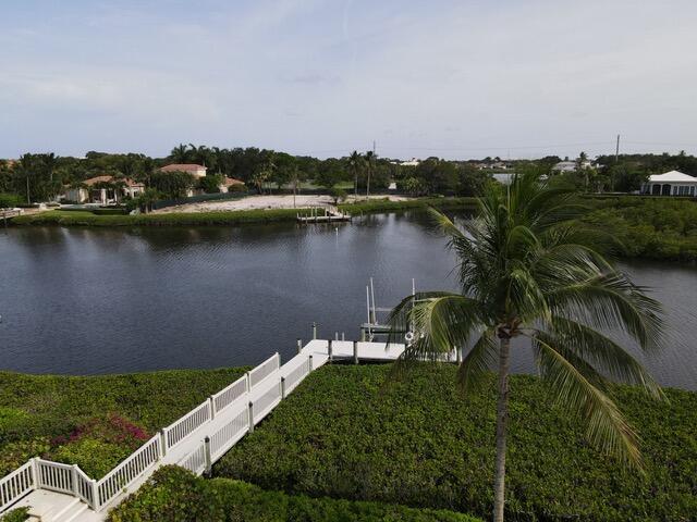 Open water long view with desirable Southern exposure.  Wide open view to also enjoy the beautiful Florida sunsets. No fixed bridges. Enjoy every amenity at Admirals Cove including marina, spa, salon, 45 holes of golf, tennis, pickle ball, multiple dining venues, pool, spa and so much more.