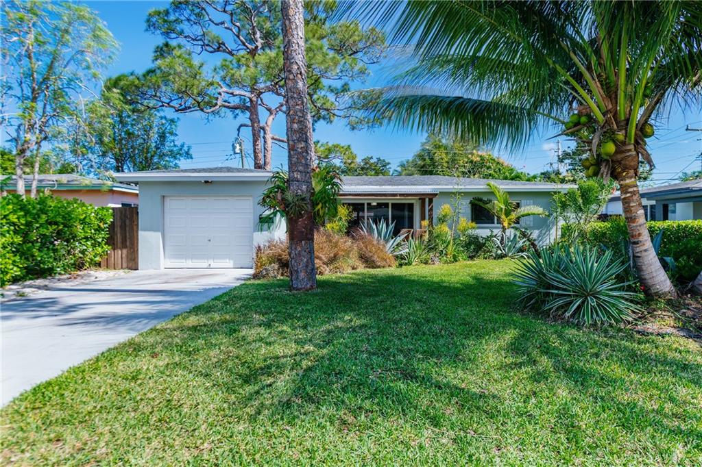 Proudly presenting North Andrews Gardens newest three bedroom one bathroom! Take advantage of this bright spacious floor plan featuring an expandable kitchen with white cabinetry, black quartz counter tops, glass back splash, updated bathroom,  central A/C (2017),  impact glass, newer roof (2018), updated plumbing / electrical, fenced yard, out door shower and room for a pool! The third bedroom is a garage conversion with impact rated door. Square footage larger than shown on tax roll. Located in hight desirable North Andrews Gardens.