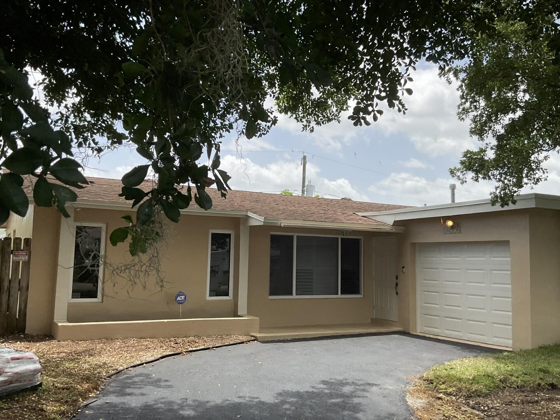 Nice home in the heart of Sunrise,  3 bed 2 full bathrooms,  All new Kitchen equipment ordered, all Stainless Steel(Frig,Stove,Micro Wave, and Dishwasher.) Impact windows through-out, Outside doors steel impact rated,All widows inside have PVC casement shutters. House outside repainted, inside new paint in family room, dining room and Primary bedroom. floors are vinyl planks through out  (some strips need replacing). Nice  back yard, Garage is over sized , washer/dryer, Water heater is on demand and is natural gas . Must see
