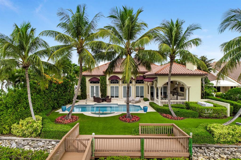 RARE OPPORTUNITY TO LIVE ON A PRIVATE ISLAND IN ADMIRALS COVE. MINUTES TO THE INTRACOASTAL WITH NO FIXED BRIDGE.  JUST COMPLETED  FULL RENOVATION. FULLY DESIGNER FURNISHED TURNKEY SINGLE STORY TRANSITIONAL STYLE CUSTOM POOL HOME FEATURING 4 BEDROOMS/3 1/2 BATHS. GREAT ROOM  SPLIT BEDROOM FLOOR PLAN. TILED 3 CAR GARAGE WITH LOADS OF STORAGE. UNPARALLED QUALITY. EXTENDED MARBLE LOGGIA WITH WINDOWS,  TV, FIREPLACE, FULL SUMMER KITCHEN AND RETRACTABLE AWNINGS. LUSH LANDSCAPING AND FAUX GRASS BLANKET THE LARGE LOT. NEW DOCK WITH 30,000 LB BOAT LIFT. SOUTHERN EXPOSURE. IMPACT WINDOWS/DOORS. FULL HOUSE GENERATOR.


         THIS HOME HAS IT ALL!
