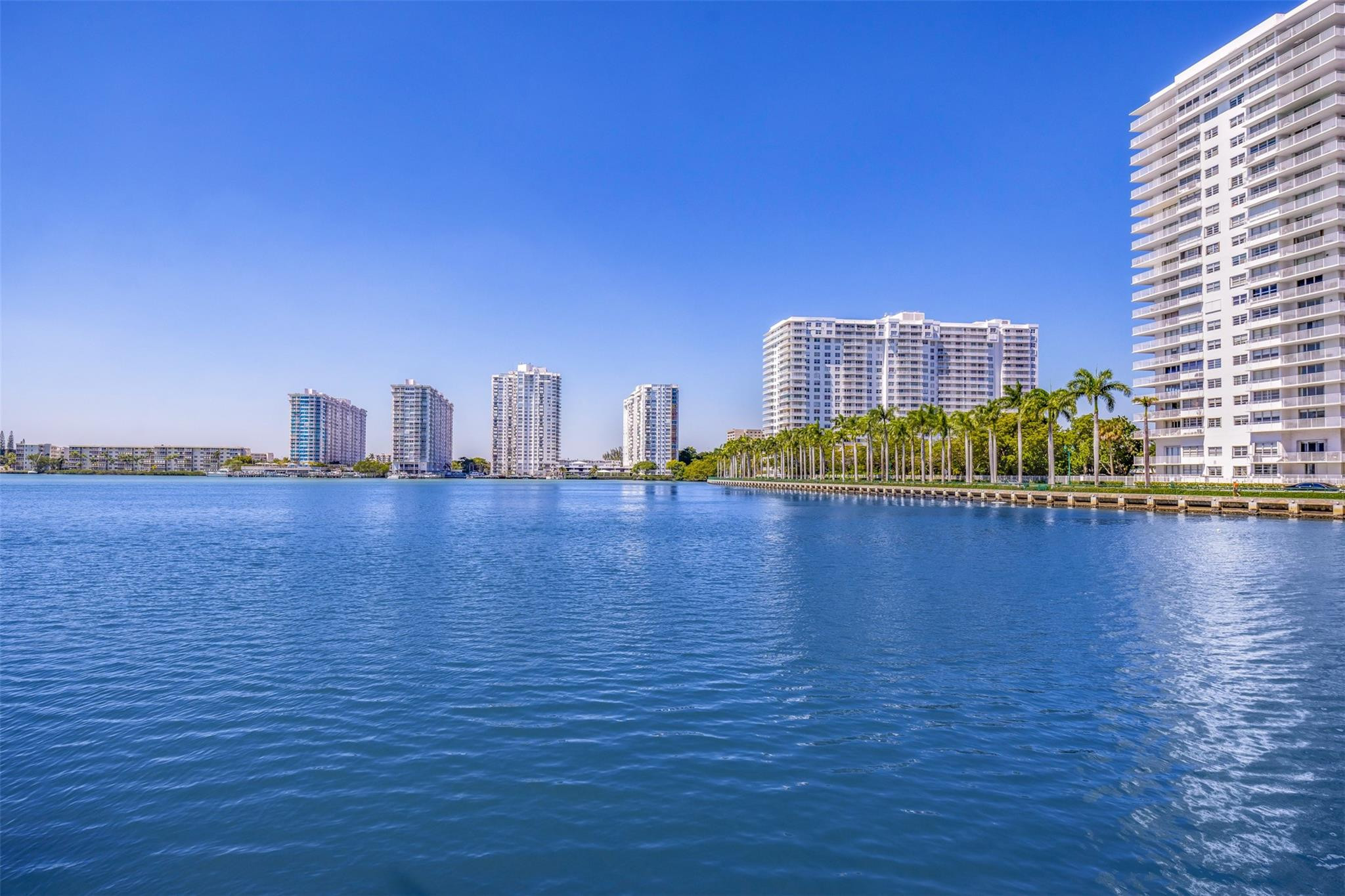 Brand-new floor-to-ceiling impact windows enhance this bright and spacious condo in sought-after Biscayne Cove Towers. Split floor plan featuring two private primary suites, each with its own full bath. Open-concept layout with a generous kitchen, living and dining areas, plus a newly remodeled private terrace. Resort-style amenities include a fitness center, tennis and basketball courts, heated pool, 24-hour attended lobby, security, covered parking, and valet. Conveniently located minutes from Aventura Mall, beaches, top-rated schools, and major airports.