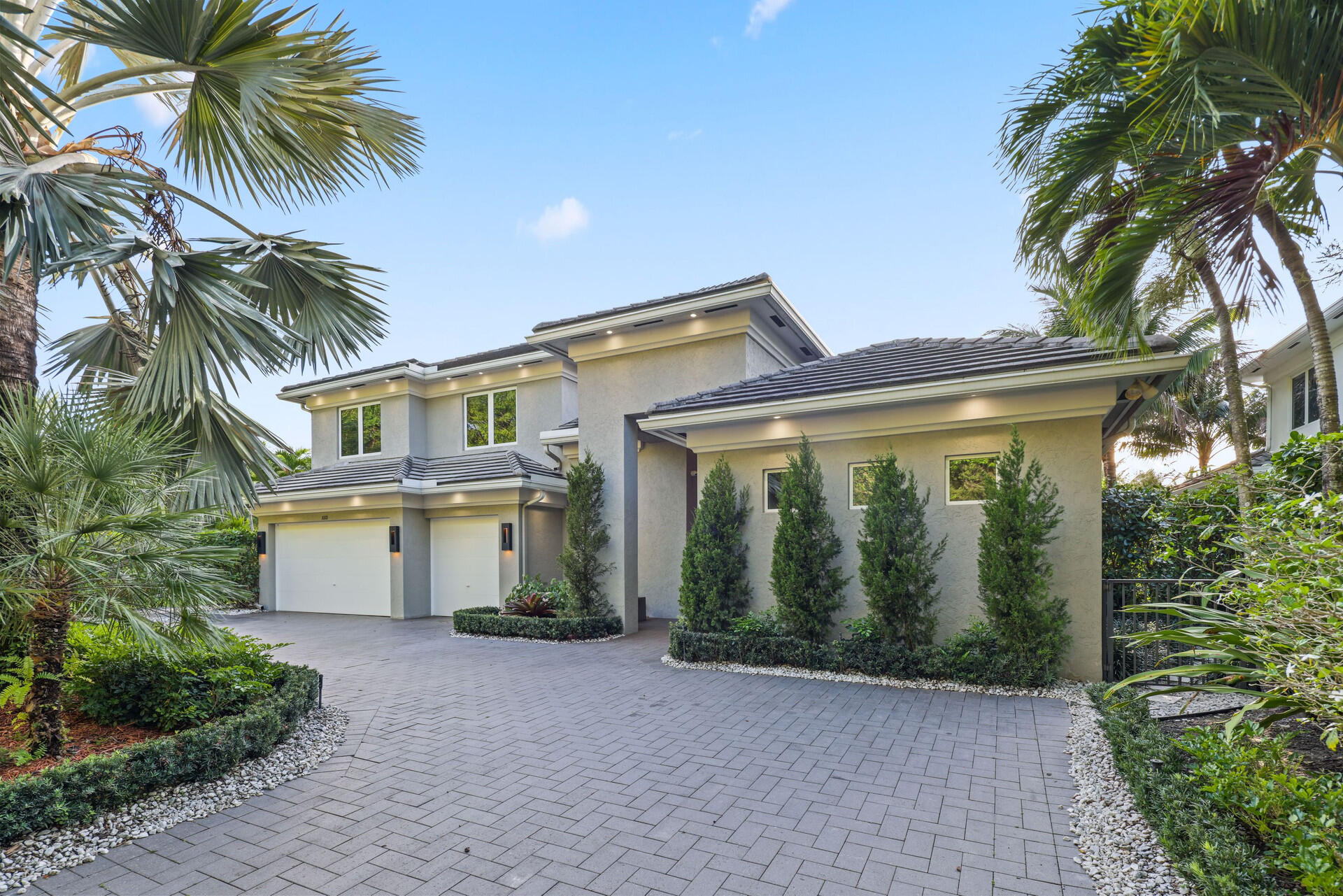 Live the life of luxury in the prestigious guard-gated community of Hawk's Landing.  This 2019 home features a beautiful modern 5 bed/4 bath plus office lakefront estate. Gourmet kitchen, quartz countertops, white porcelain floors downstairs and dark wood floors upstairs. Electric window shades, complete impact windows & doors, central vac.  Split bedroom plan with primary, secondary bedroom and office downstairs. Additional loft space and three bedrooms upstairs, one en-suite. 3 car garage and separate laundry room. The back yard features a heated, salt water pool, recently updated with diamond brite.  Summer kitchen and a tranquility garden over looking the lakefront and amazing sunsets.  White/gray marble pool patio. Home is located at the end of a quite street.   The 15,000 sqft Community Clubhouse features a resort-style pool, full service spa, and state of the art fitness center with organized activities for children and adults. The clubhouse is currently under renovation, updating this magnificent space for the residents to enjoy. The clubhouse property also boasts seven lighted tennis courts, 2 pickle ball courts, a basketball court and community playground.                All measurements, square footages, lot sizes, calculations have been obtained and conveyed from third parties such as the Multiple Listing Service, BCPA and public records. All information including that produced by the Sellers or Listing Company are subject to errors or omissions. Buyer should independently verify all information.