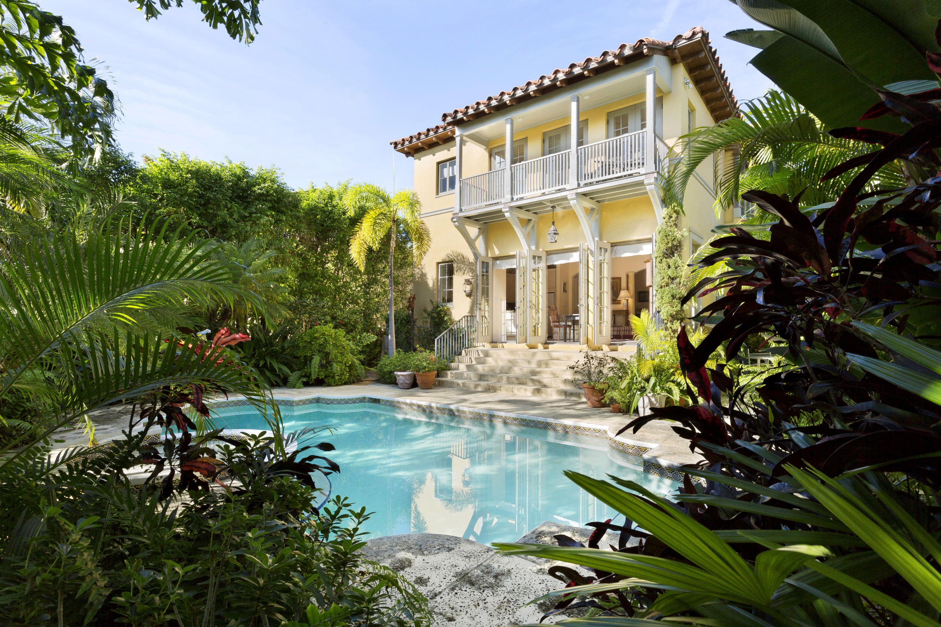 This 2003 Mediterranean has all the comforts for today's lifestyle such as 10 foot ceilings throughout, well designed floor plan, impact doors and windows, smart wiring, sound system, heated pool and lush tropical landscaping.  Perfectly located in mid-town close to shopping, restaurants, beach and Lake Trail.