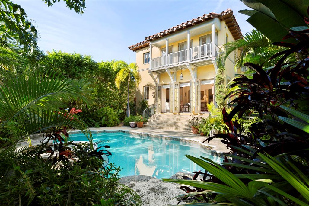 This 2003 Mediterranean has all the comforts for today's lifestyle such as 10 foot ceilings throughout, well designed floor plan, impact doors and windows, smart wiring, sound system, heated pool and lush tropical landscaping.  Perfectly located in mid-town close to shopping, restaurants, beach and Lake Trail.